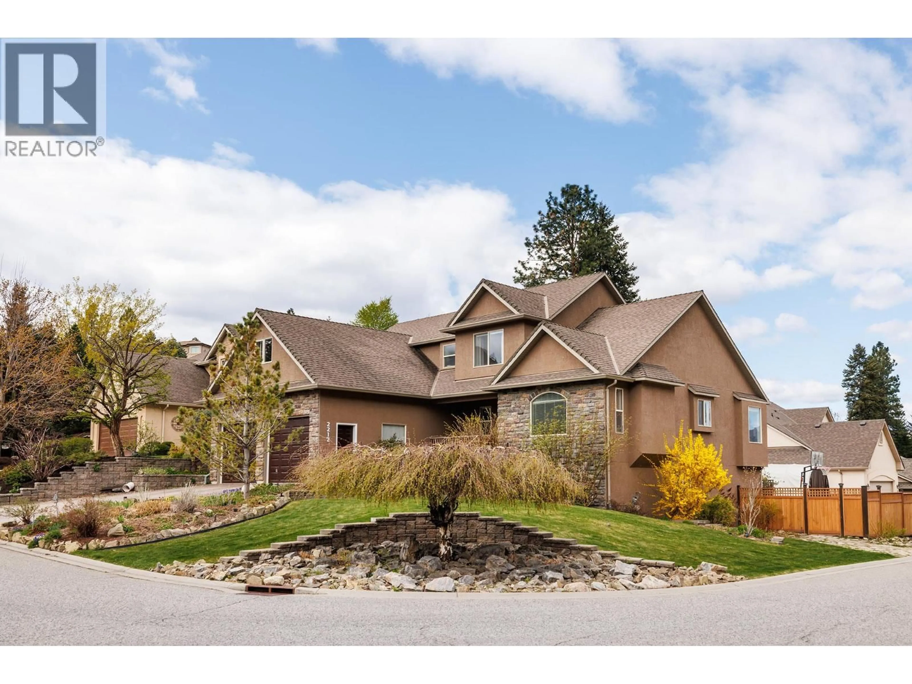 Home with brick exterior material, street for 2212 CHILCOTIN CRESCENT, Kelowna British Columbia v1v2m8
