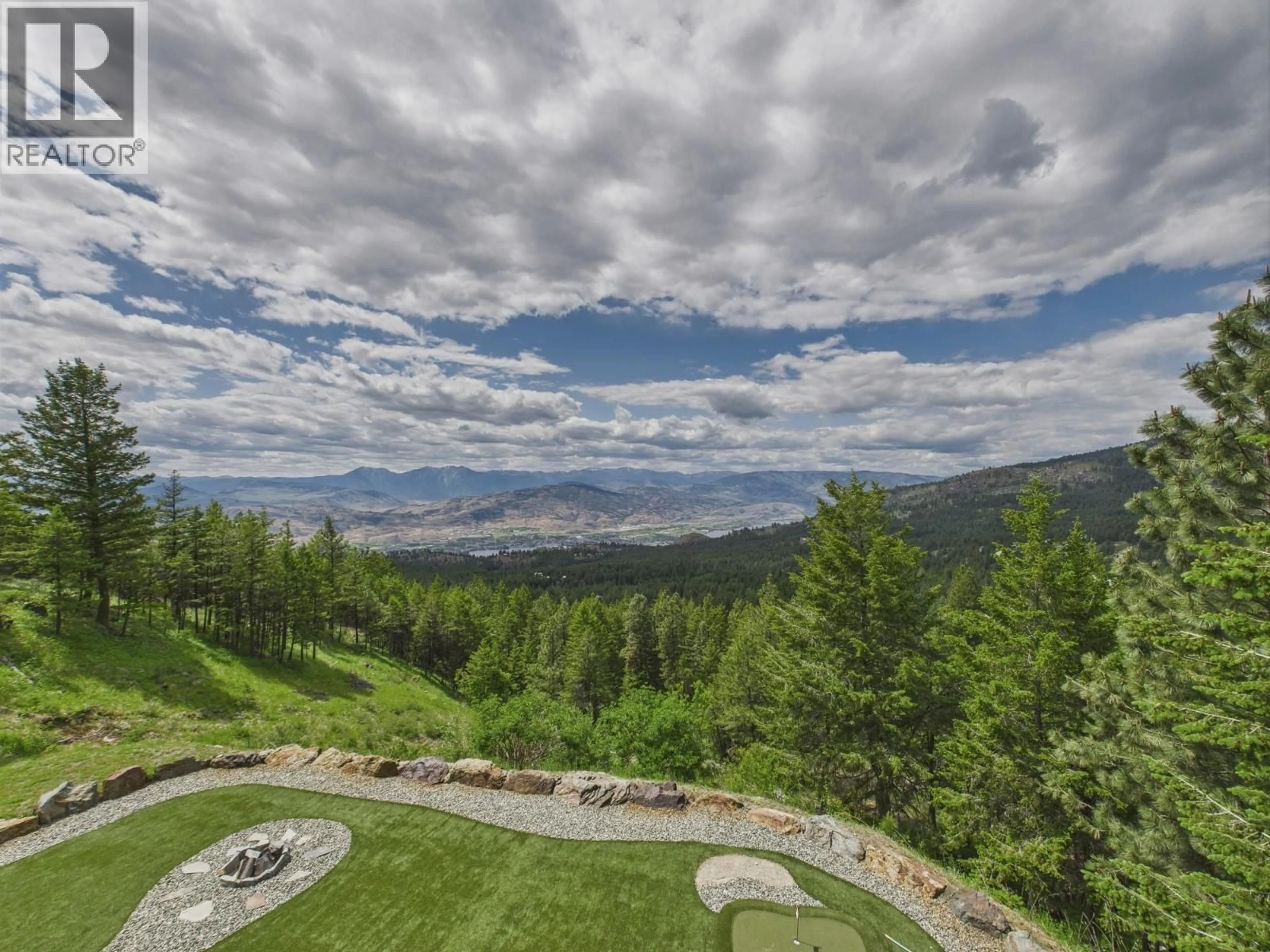 A pic from outside/outdoor area/front of a property/back of a property/a pic from drone, mountain view for 560 SASQUATCH TRAIL, Osoyoos British Columbia V0H1V3