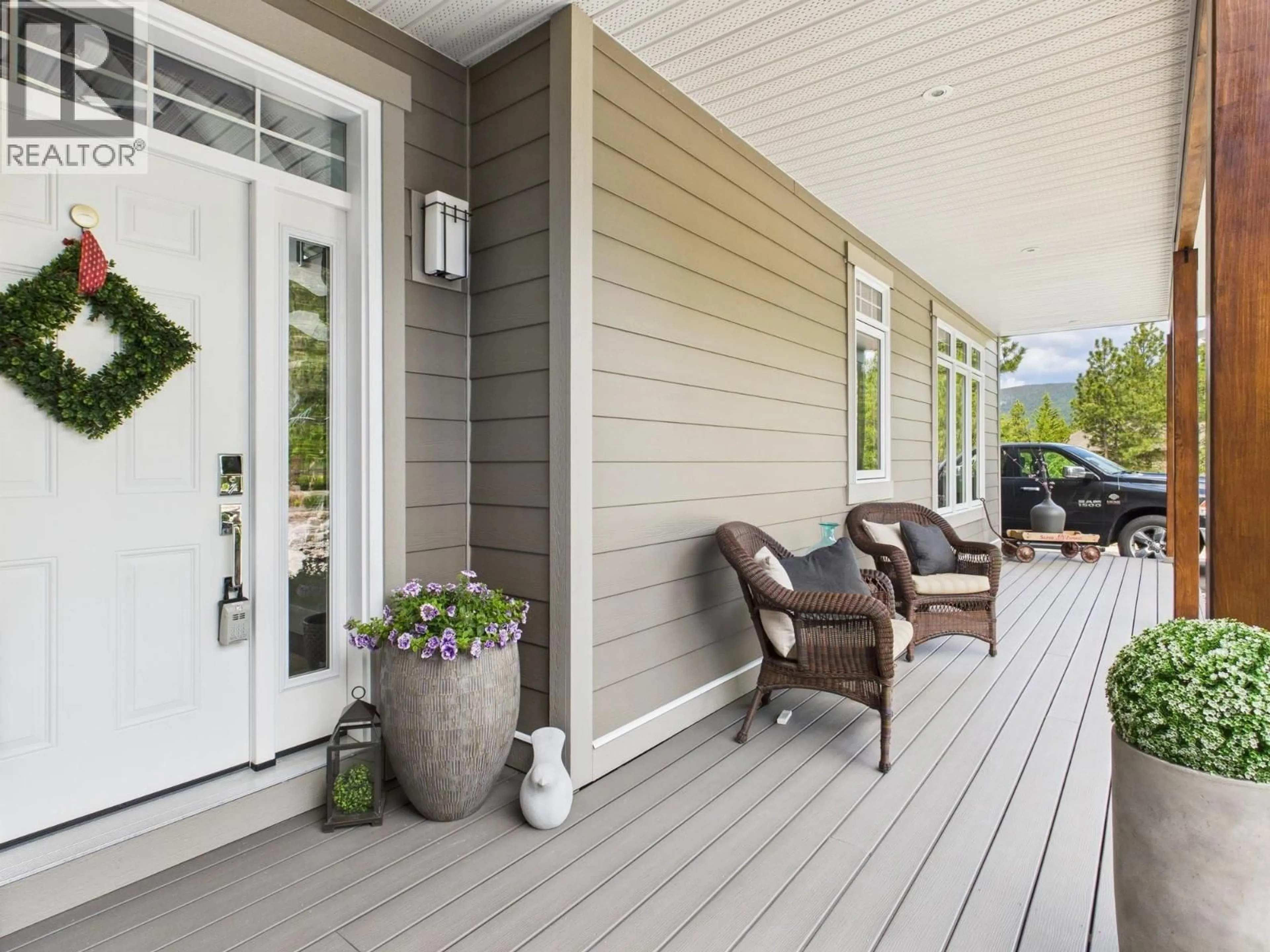 Home with vinyl exterior material, street for 560 SASQUATCH TRAIL, Osoyoos British Columbia V0H1V3