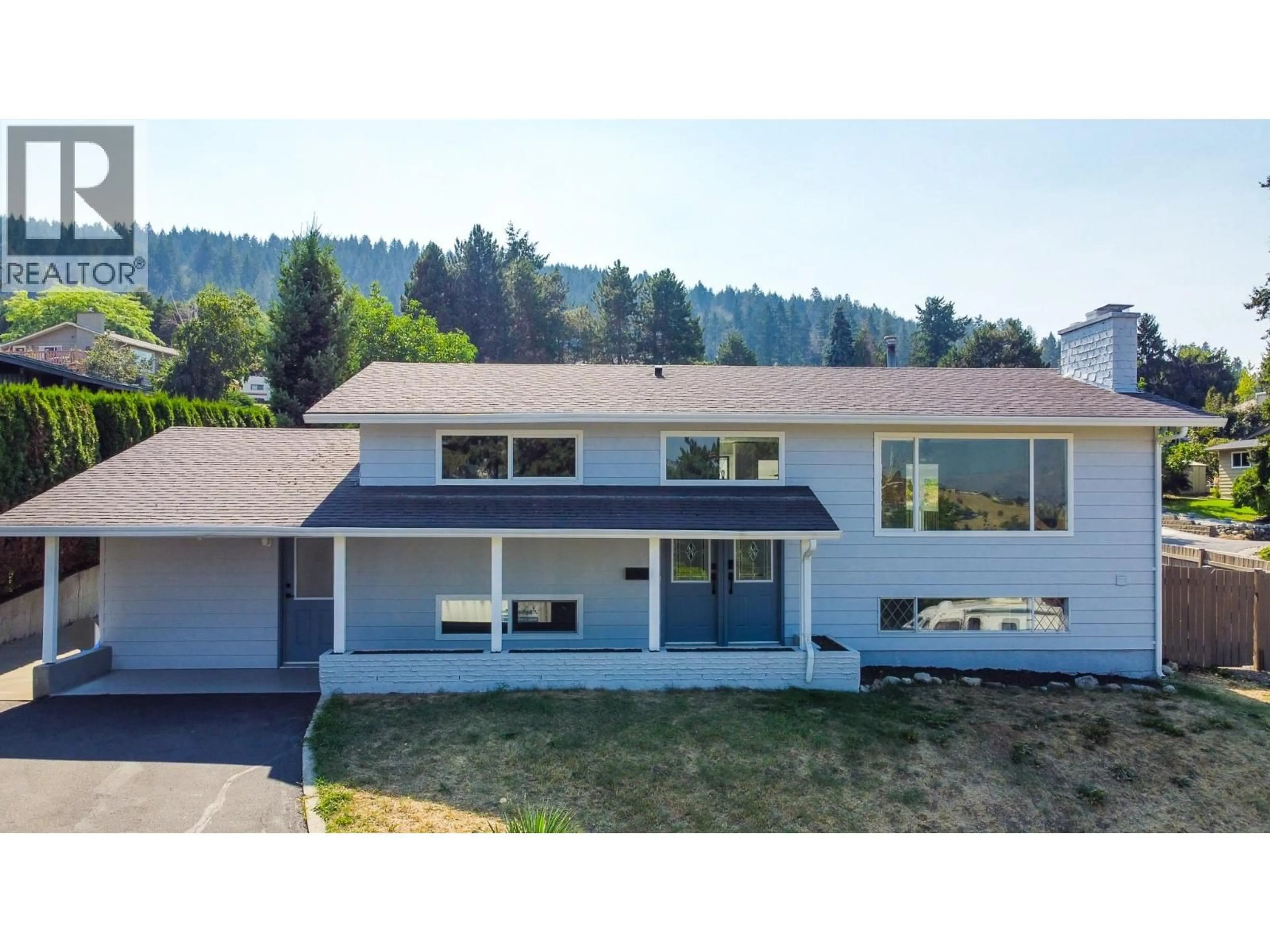 Home with vinyl exterior material, mountain view for 11429 PRIEST VALLEY DRIVE, Coldstream British Columbia V1B1B4