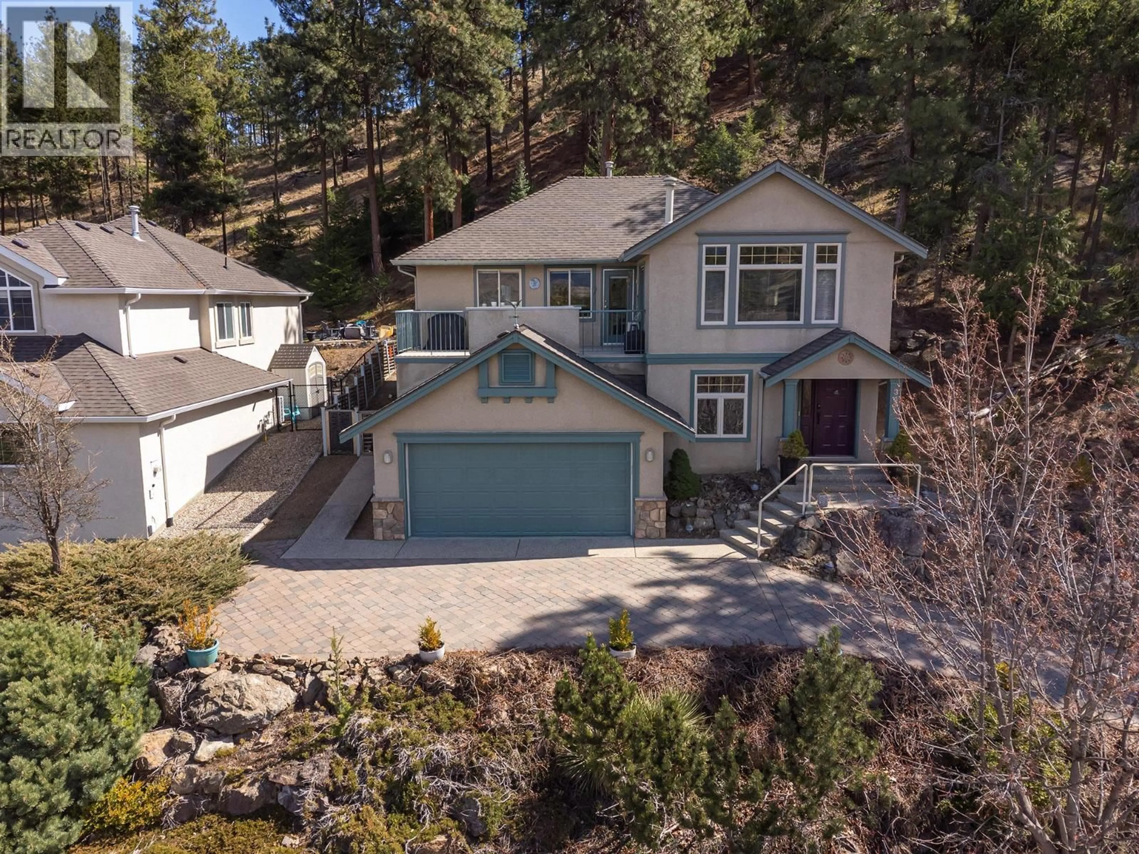 A pic from outside/outdoor area/front of a property/back of a property/a pic from drone, unknown for 347 WOODWIND COURT, Kelowna British Columbia V1V2L3