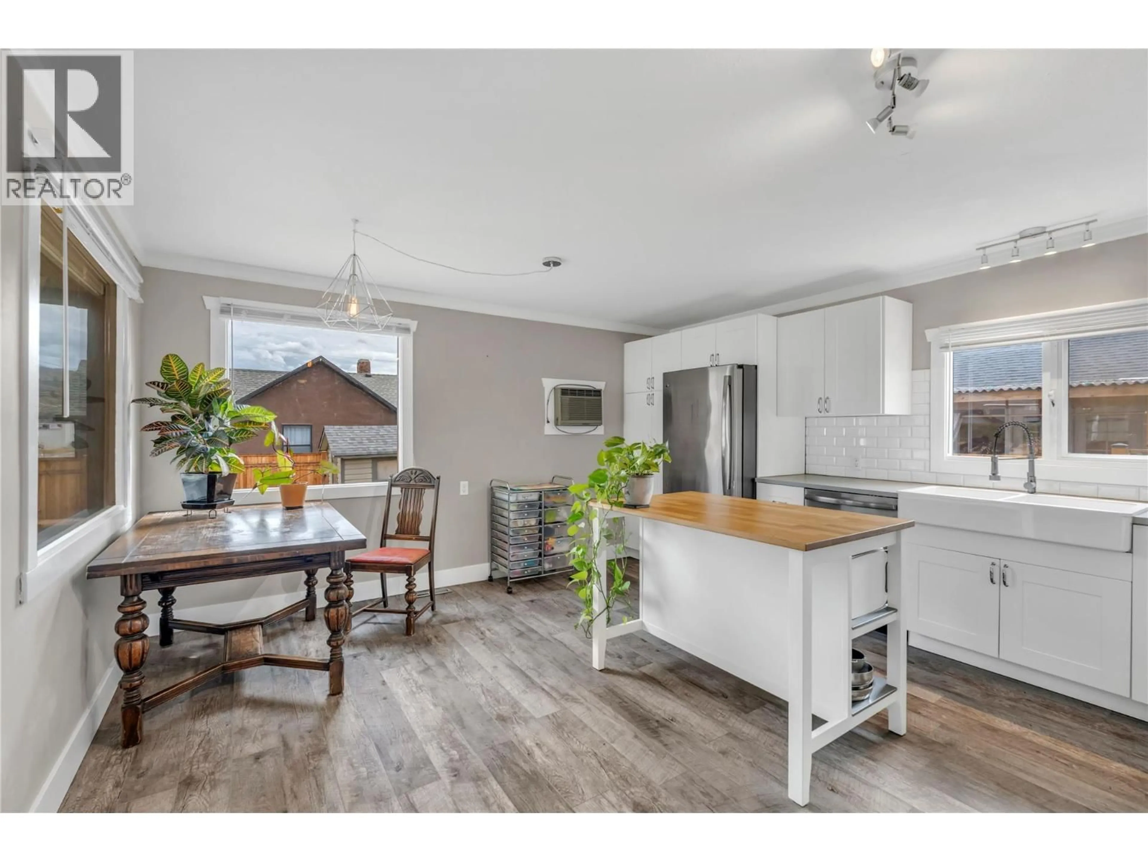 Open concept kitchen, wood/laminate floor for 5899 OKANAGAN STREET, Oliver British Columbia V0H1T0