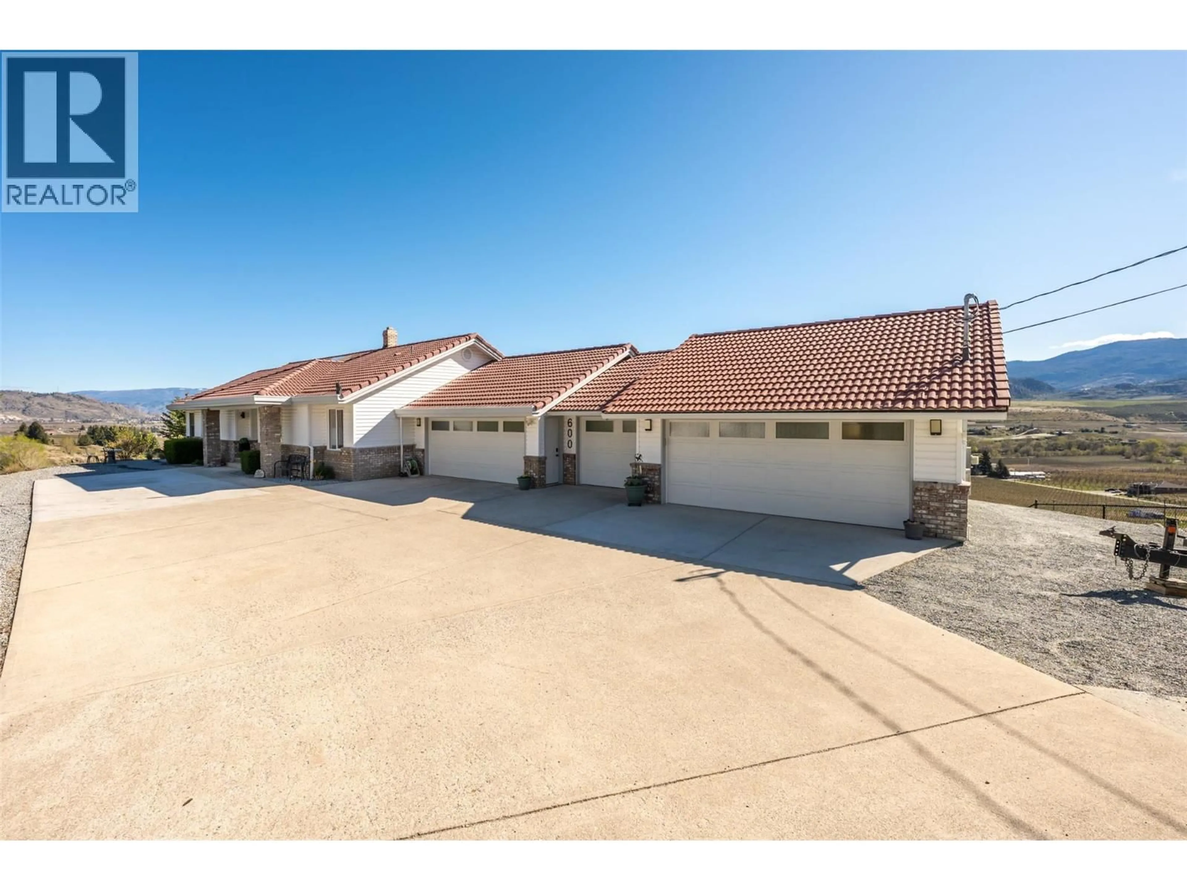 A pic from outside/outdoor area/front of a property/back of a property/a pic from drone, street for 600 PONDEROSA ROAD, Oliver British Columbia V0H1T1