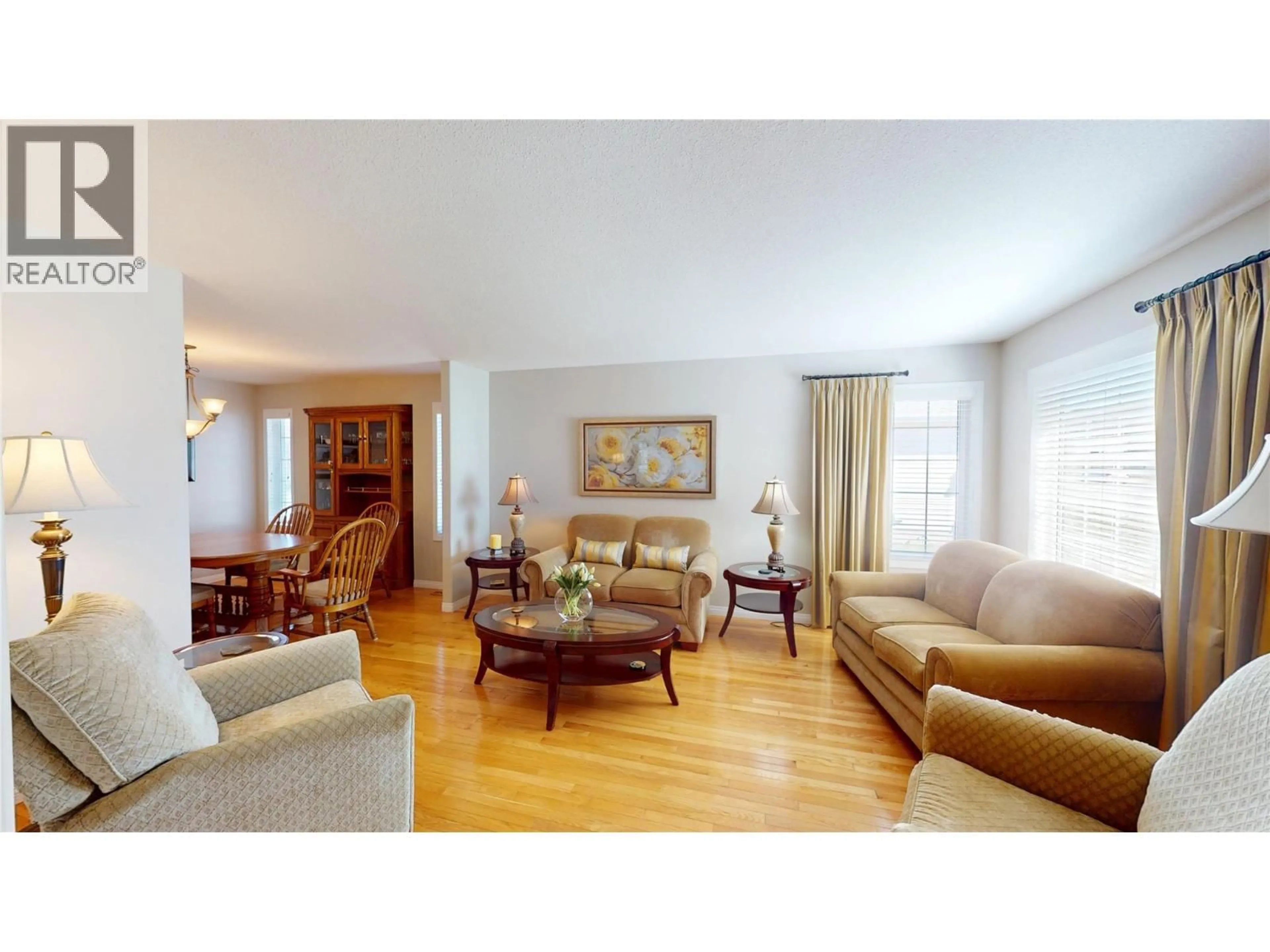 Living room with furniture, wood/laminate floor for 804 16TH STREET SOUTH, Cranbrook British Columbia V1C5N9