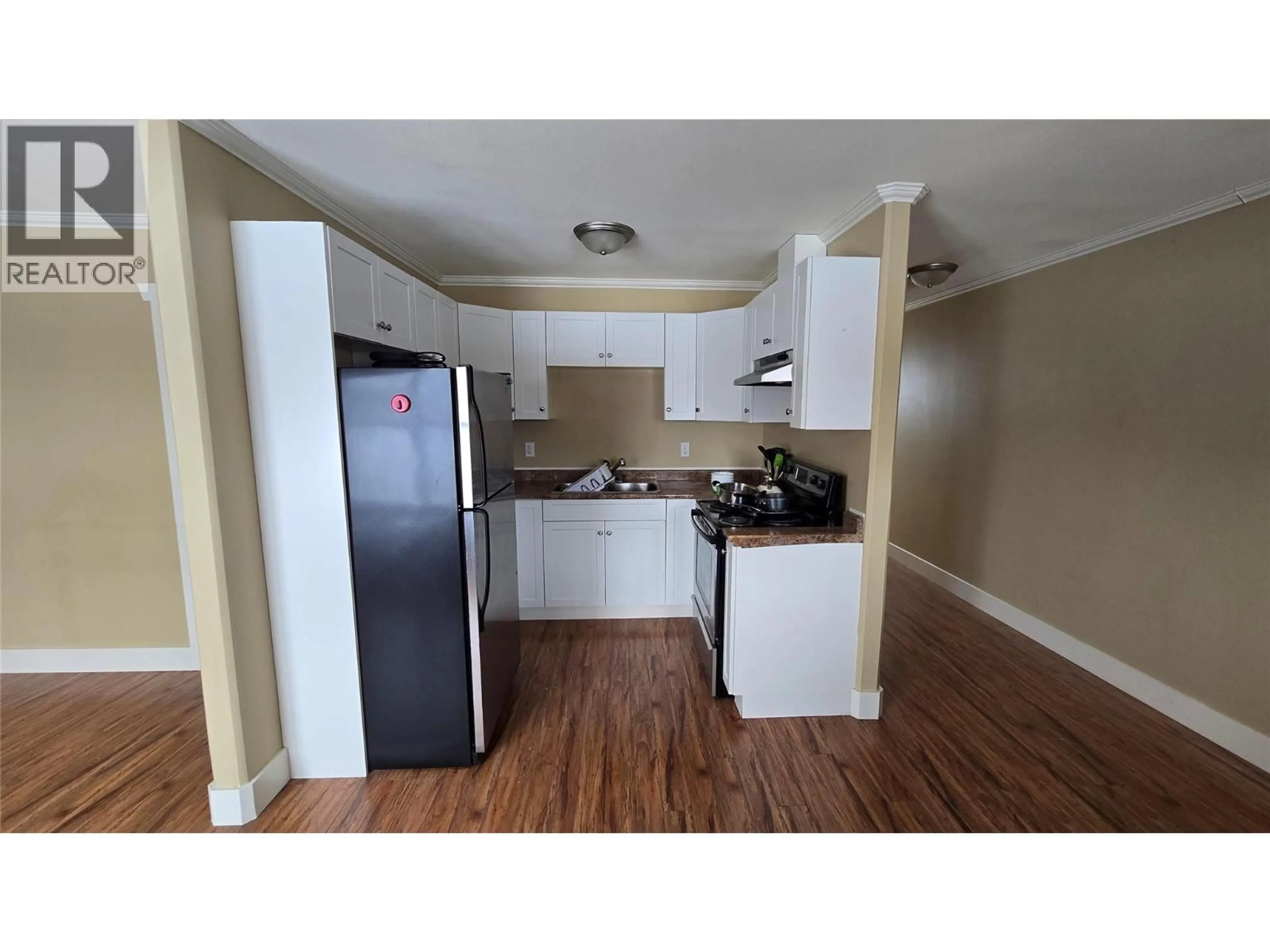 Standard kitchen, wood/laminate floor for 112 - 10209 17 STREET, Dawson Creek British Columbia V1G4C3