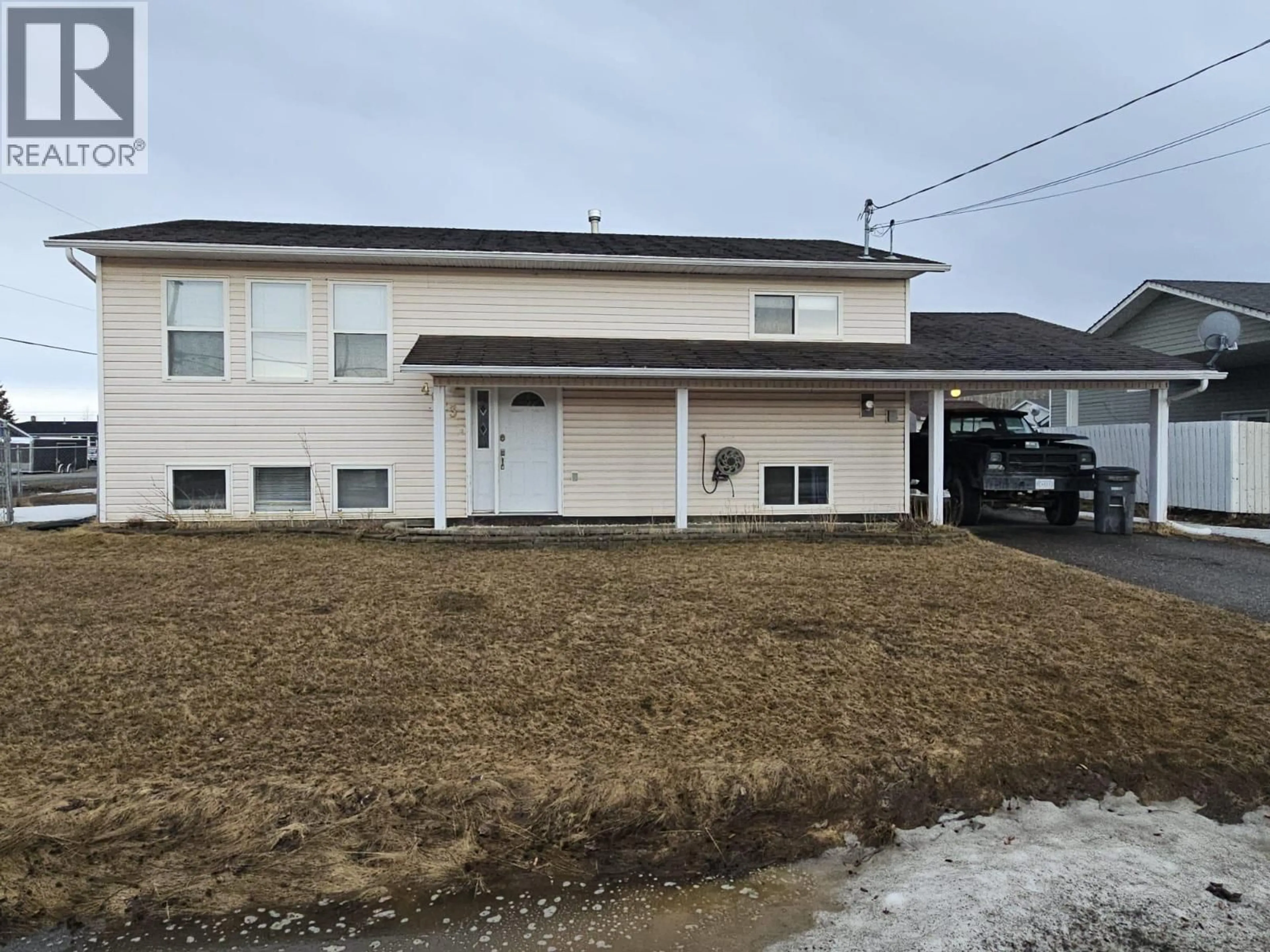 A pic from outside/outdoor area/front of a property/back of a property/a pic from drone, street for 4013 52 AVENUE NORTHEAST, Chetwynd British Columbia V0C1J0