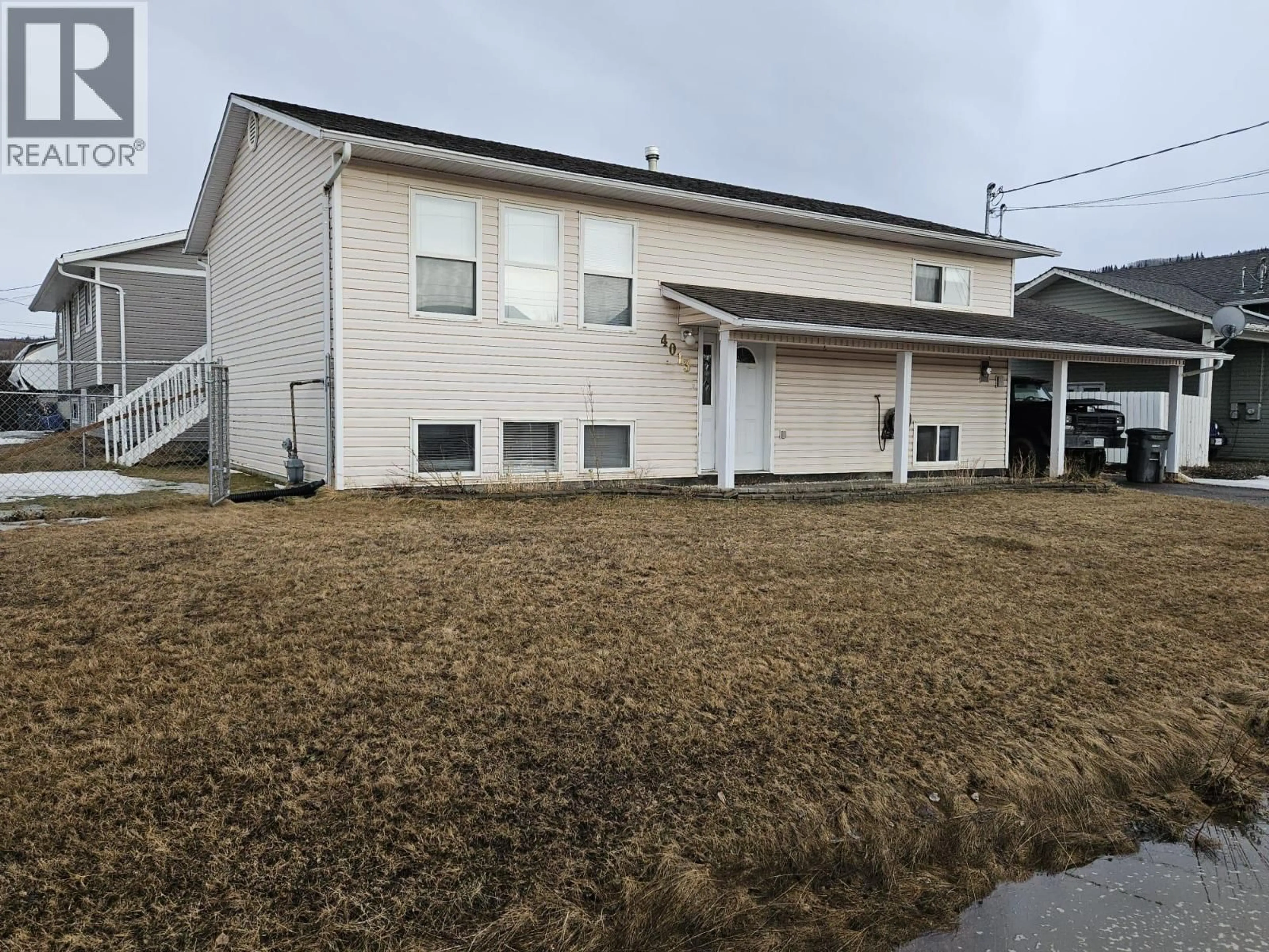 A pic from outside/outdoor area/front of a property/back of a property/a pic from drone, building for 4013 52 AVENUE NORTHEAST, Chetwynd British Columbia V0C1J0