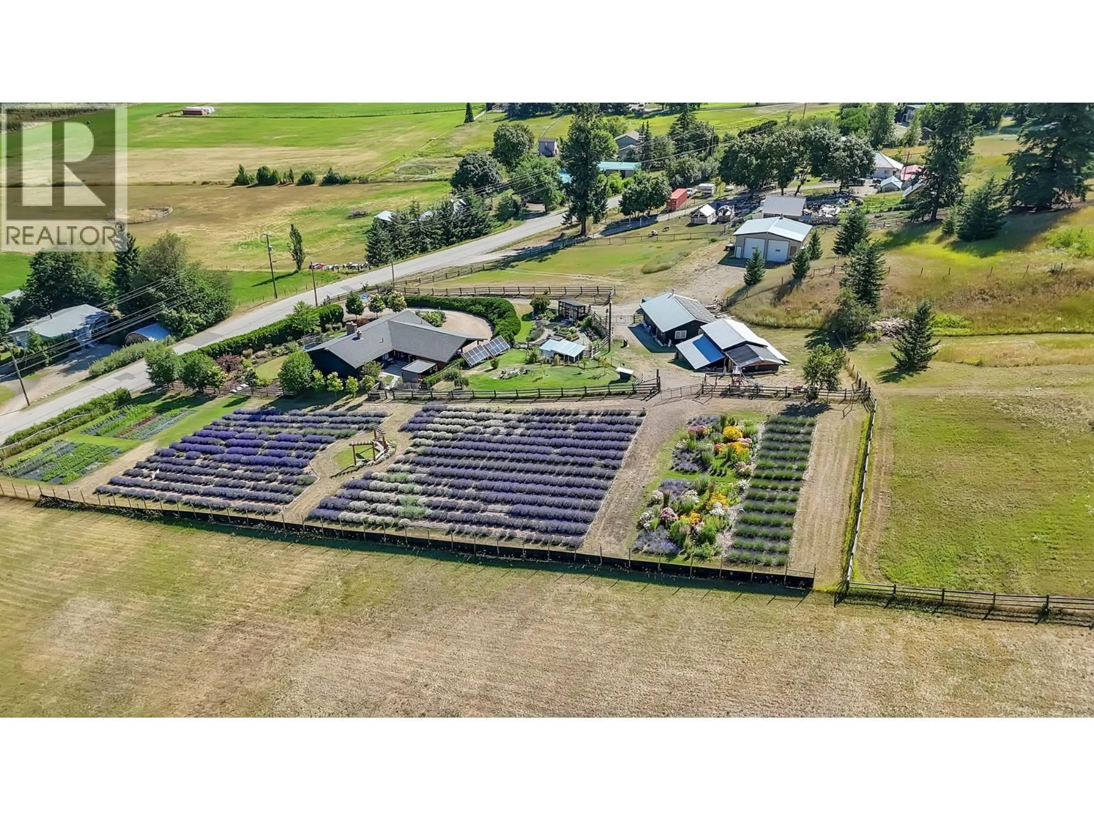 A pic from outside/outdoor area/front of a property/back of a property/a pic from drone, unknown for 5770 LEARMOUTH ROAD, Coldstream British Columbia V1B3E6