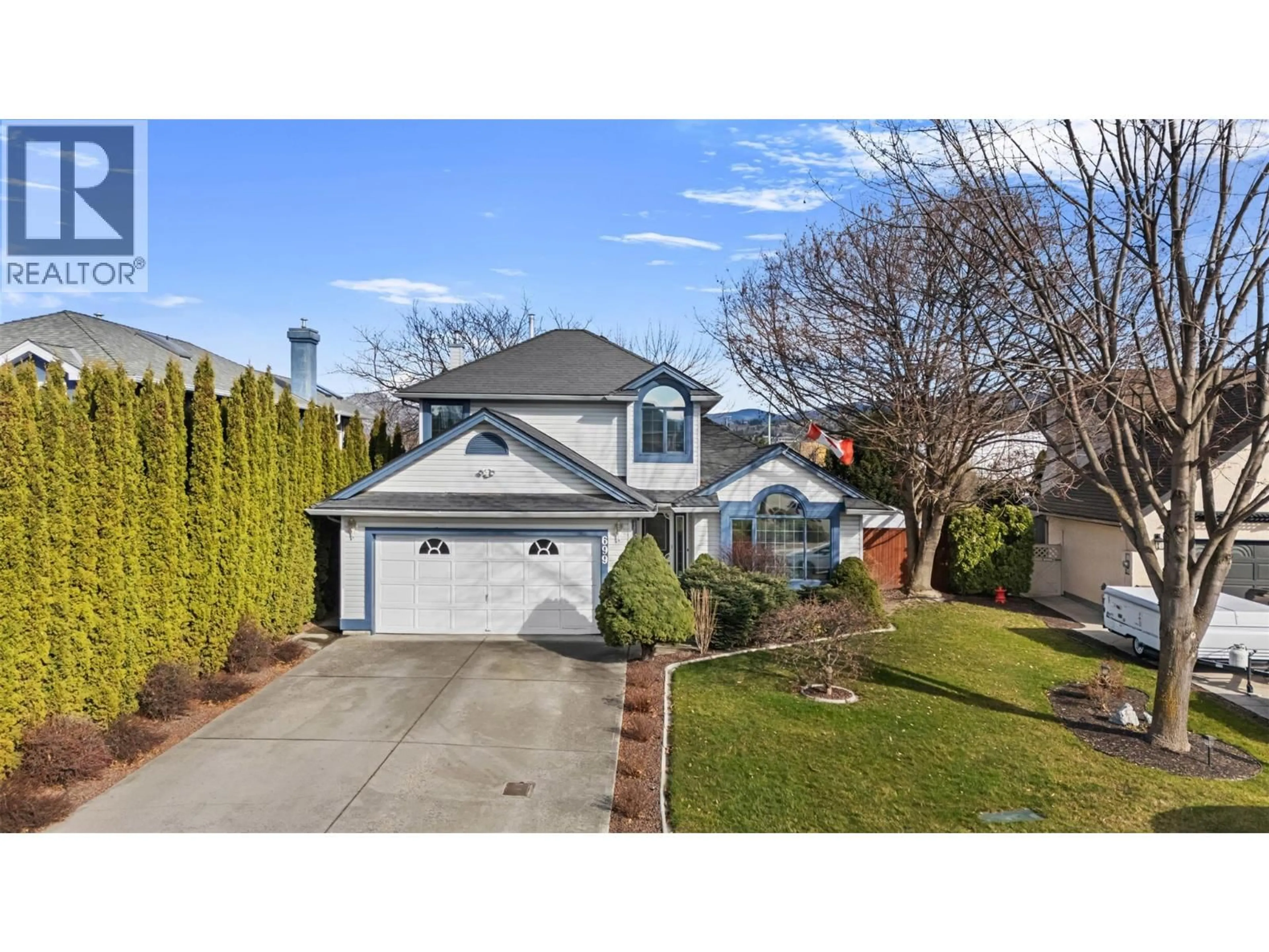 Home with vinyl exterior material, street for 699 SARATOGA PLACE, Kelowna British Columbia V1W2Z6