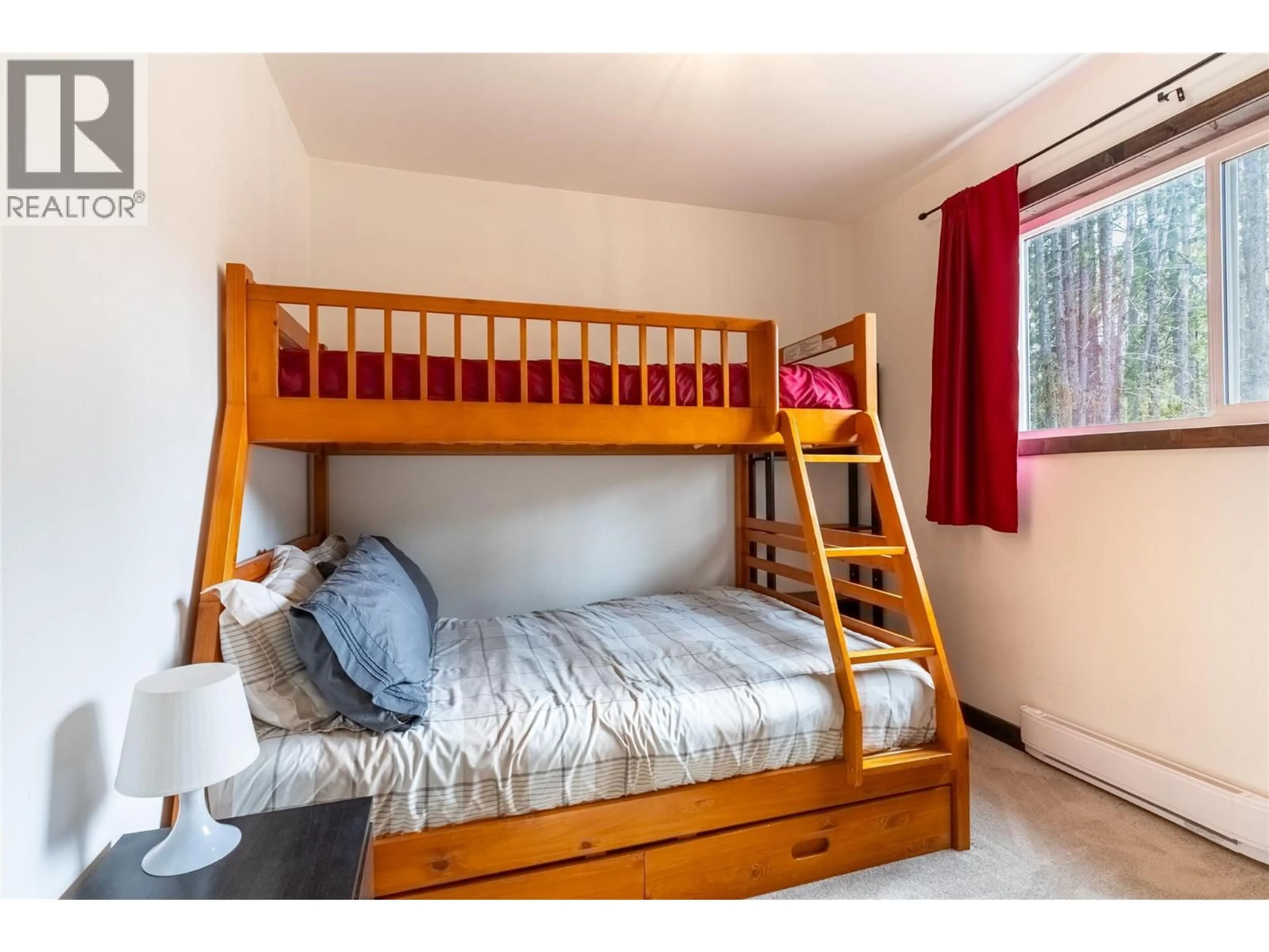 Bedroom with bed, wood/laminate floor for 3888 LOOKOUT DRIVE, Kamloops British Columbia V1S1Y8