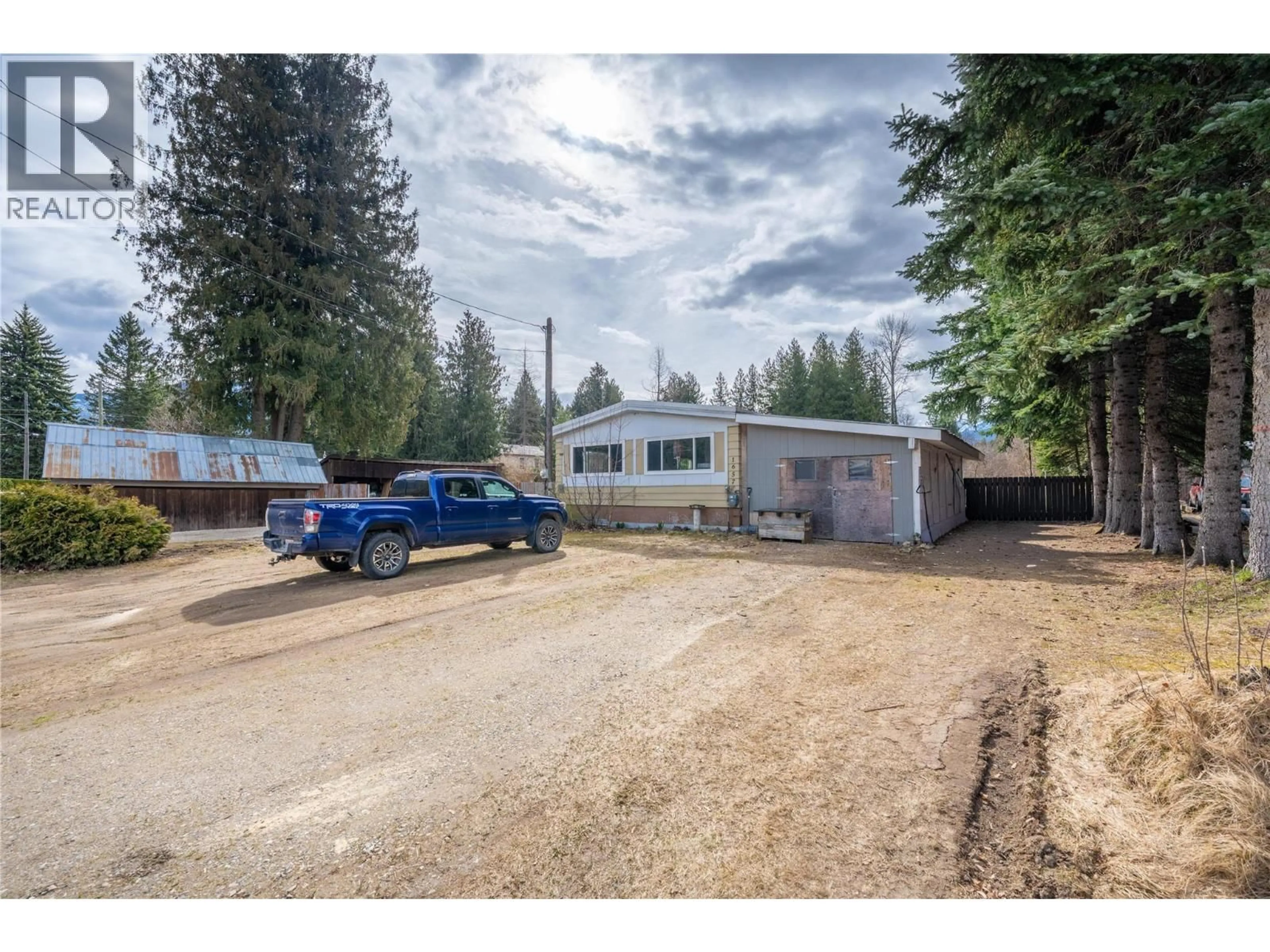 A pic from outside/outdoor area/front of a property/back of a property/a pic from drone, street for 1657 ILLINISKY ROAD, Revelstoke British Columbia V0E3K0