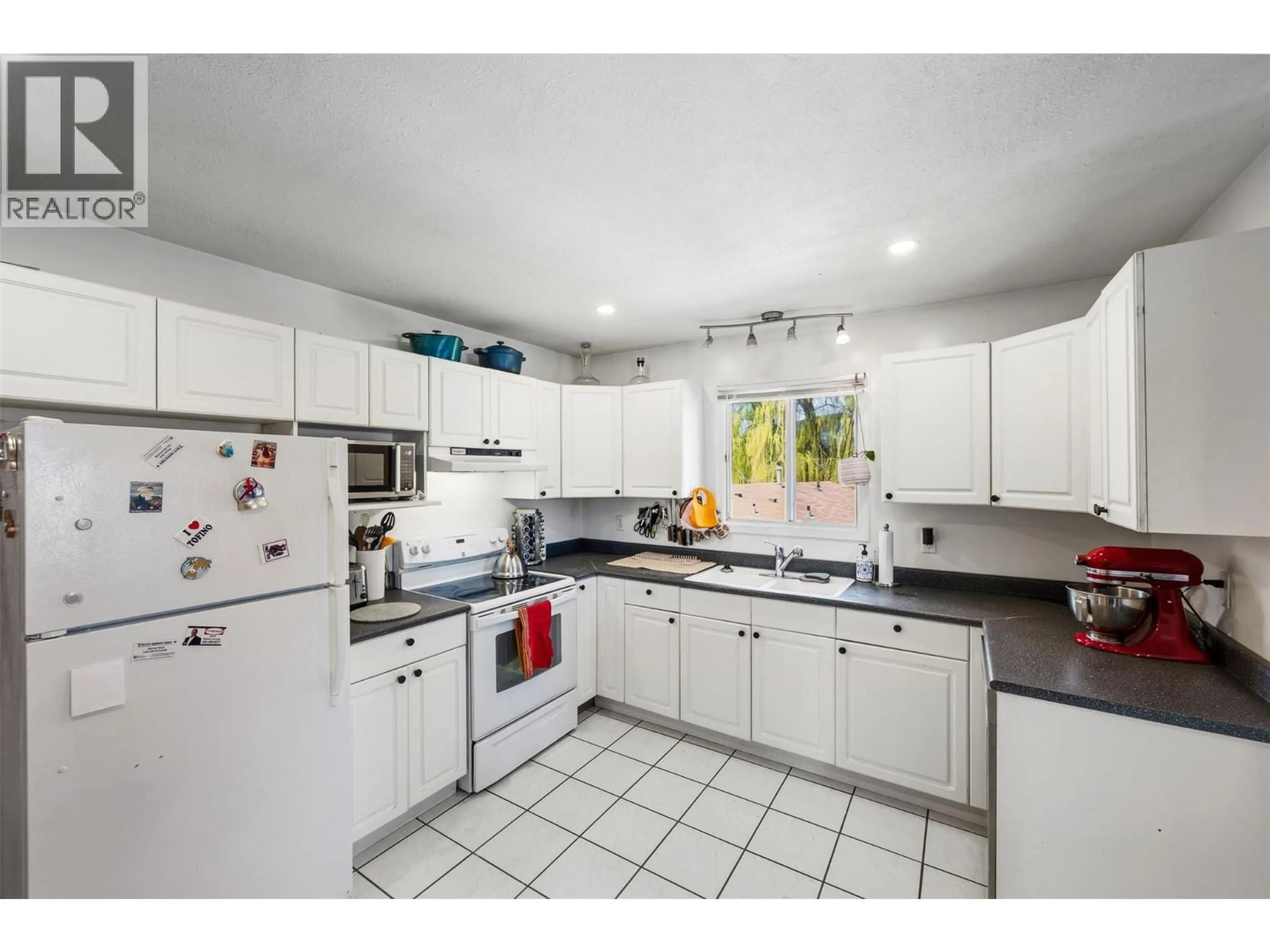 Standard kitchen, ceramic/tile floor for 3853 GLENWAY ROAD, West Kelowna British Columbia V4T1C9