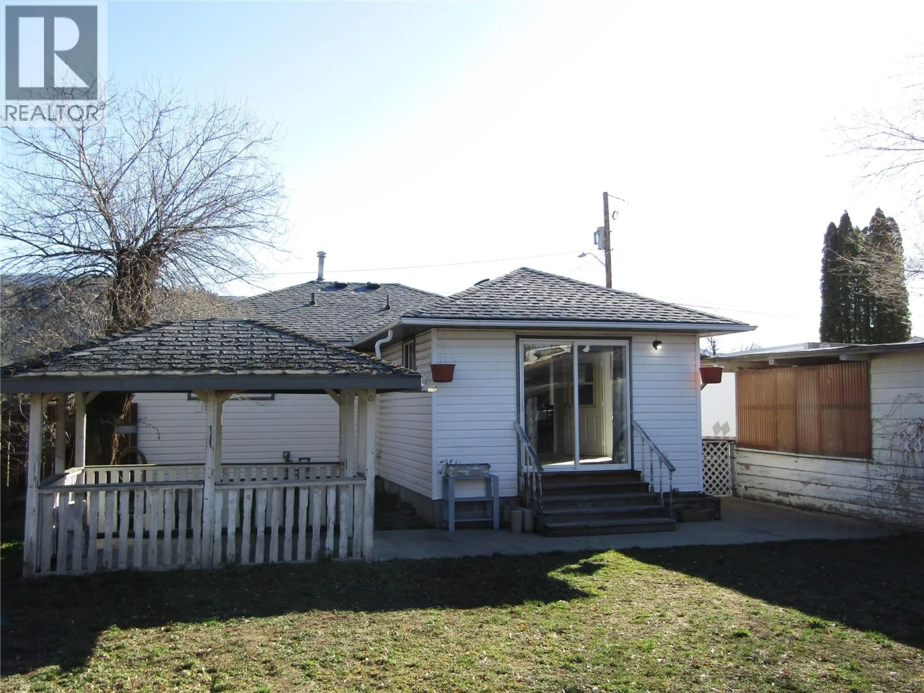 A pic from outside/outdoor area/front of a property/back of a property/a pic from drone, street for 7643 21ST STREET, Grand Forks British Columbia V0H1H2