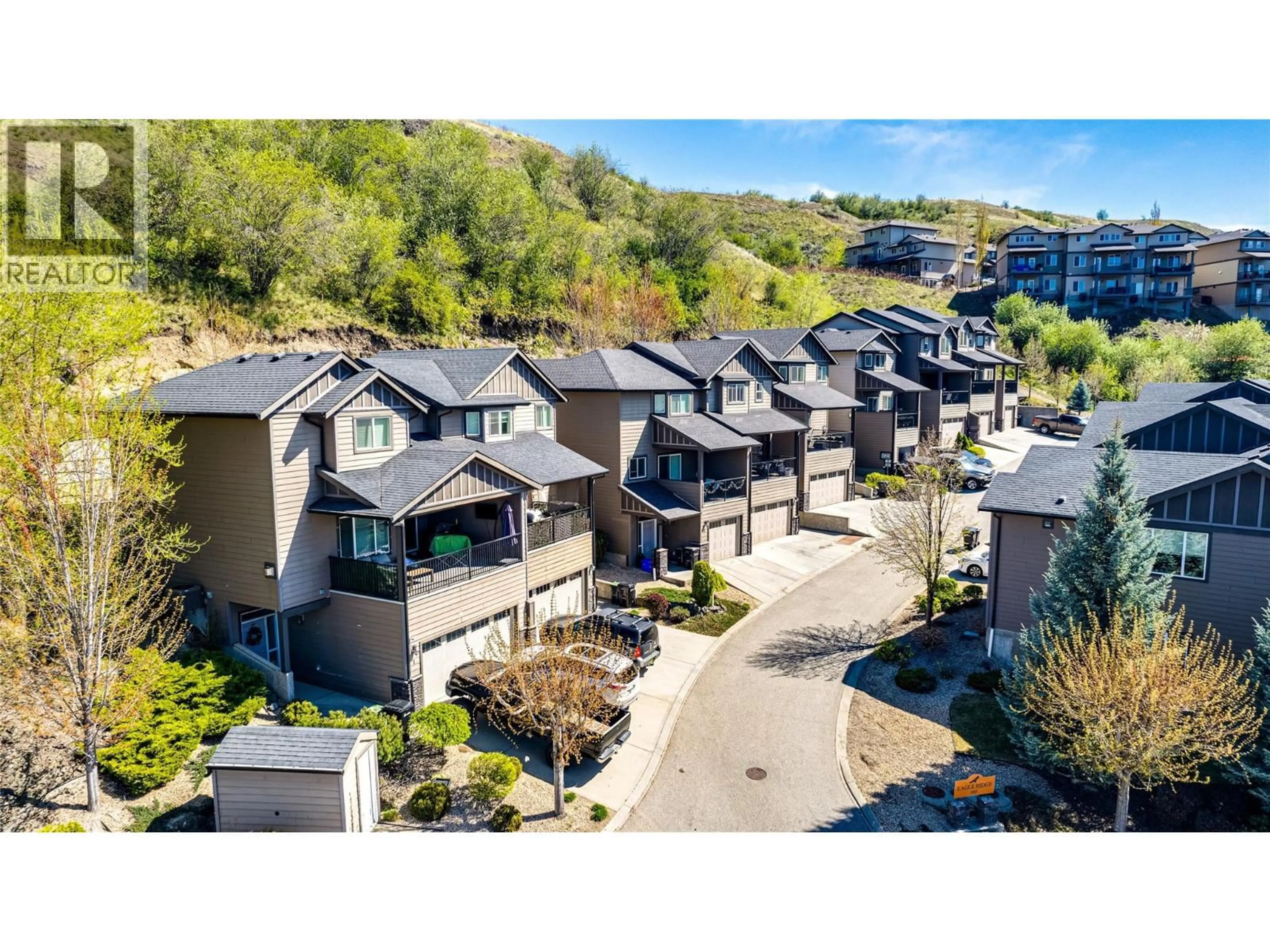 A pic from outside/outdoor area/front of a property/back of a property/a pic from drone, water/lake/river/ocean view for 4 - 995 MT. IDA DRIVE, Vernon British Columbia V1B4C3