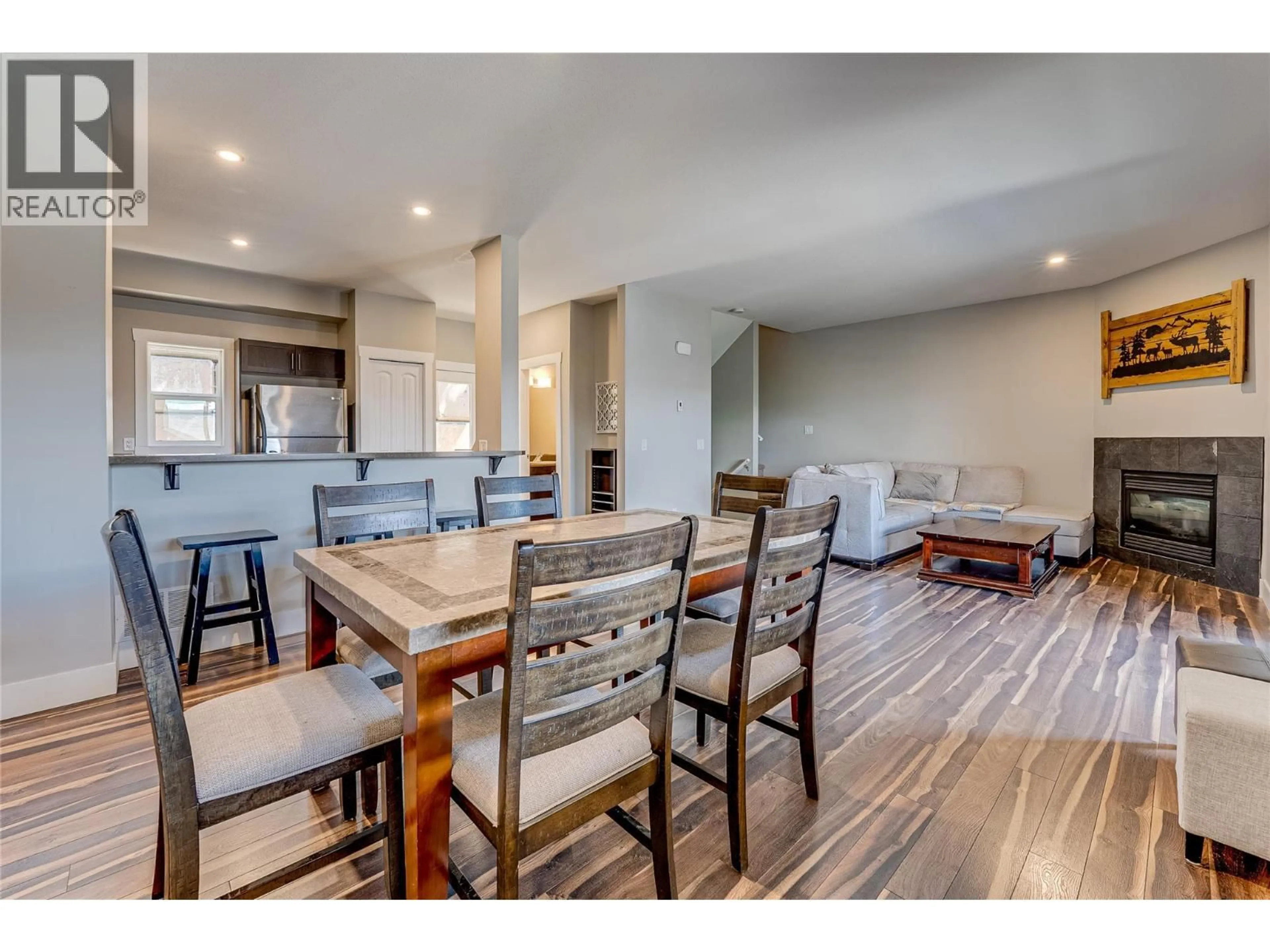 Open concept kitchen, wood/laminate floor for 4 - 995 MT. IDA DRIVE, Vernon British Columbia V1B4C3