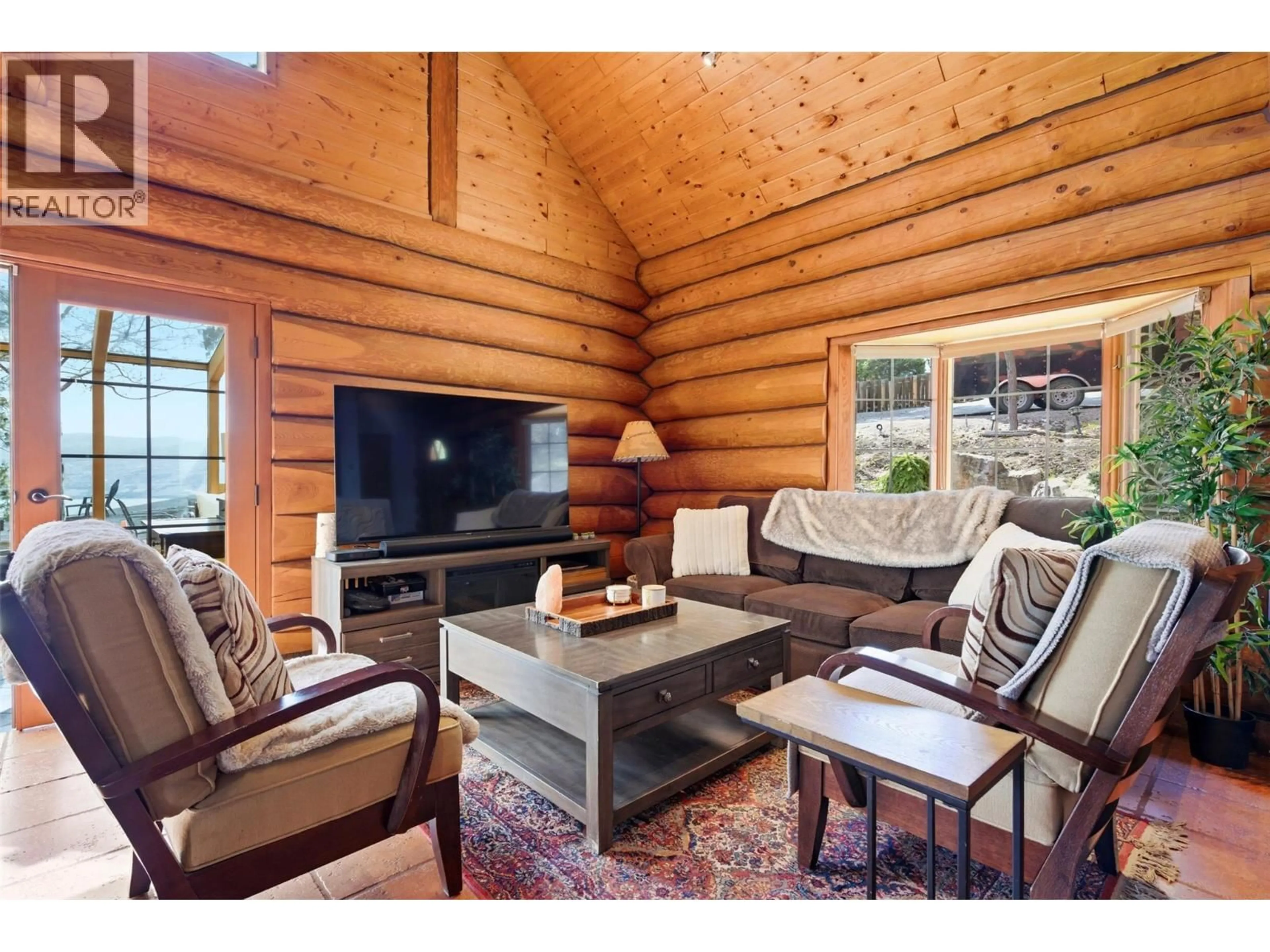 Living room with furniture, wood/laminate floor for 3743 GATES ROAD, West Kelowna British Columbia V4T1A3