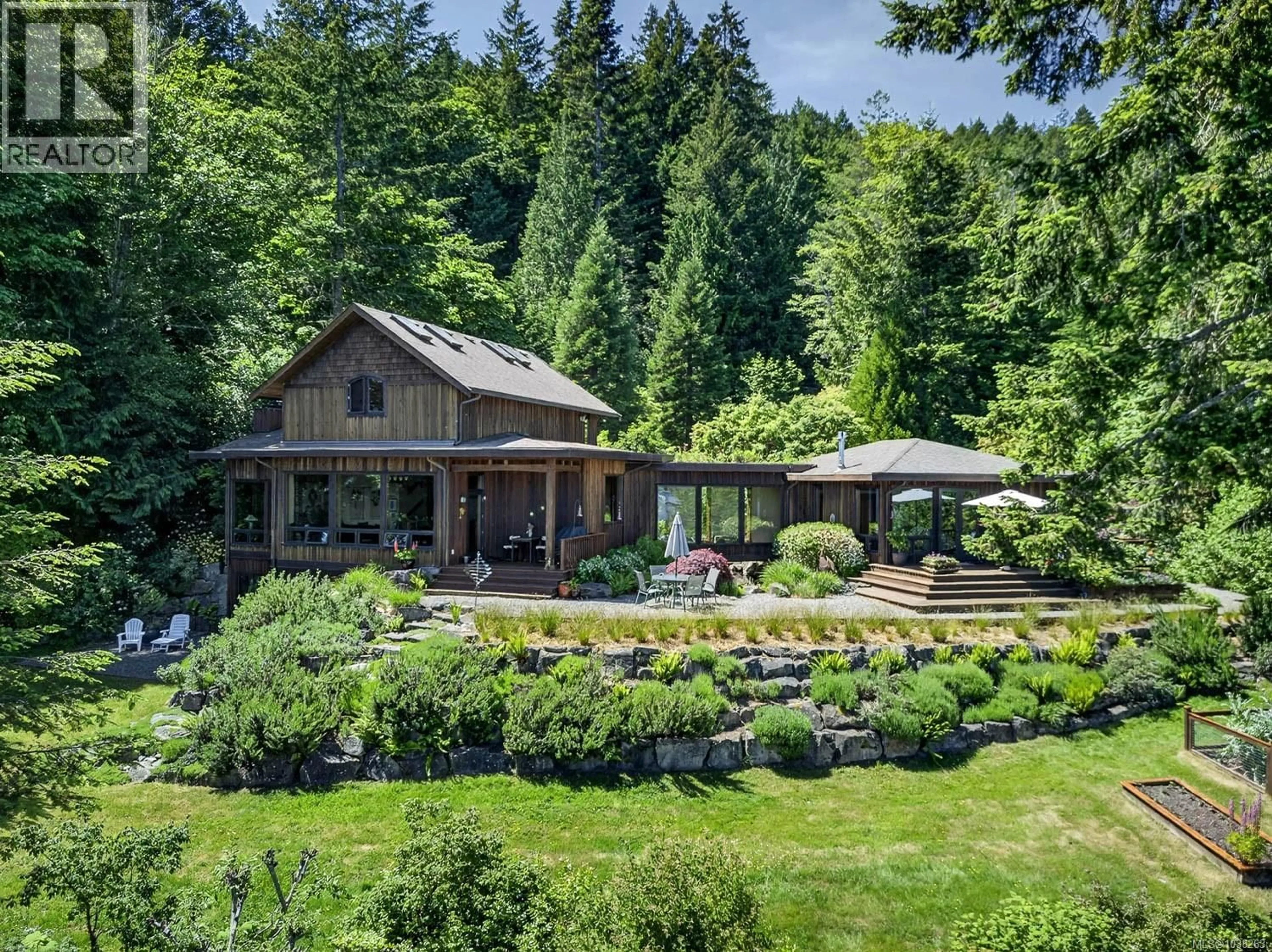 A pic from outside/outdoor area/front of a property/back of a property/a pic from drone, water/lake/river/ocean view for 405 ROLAND ROAD, Salt Spring British Columbia V8K1V1