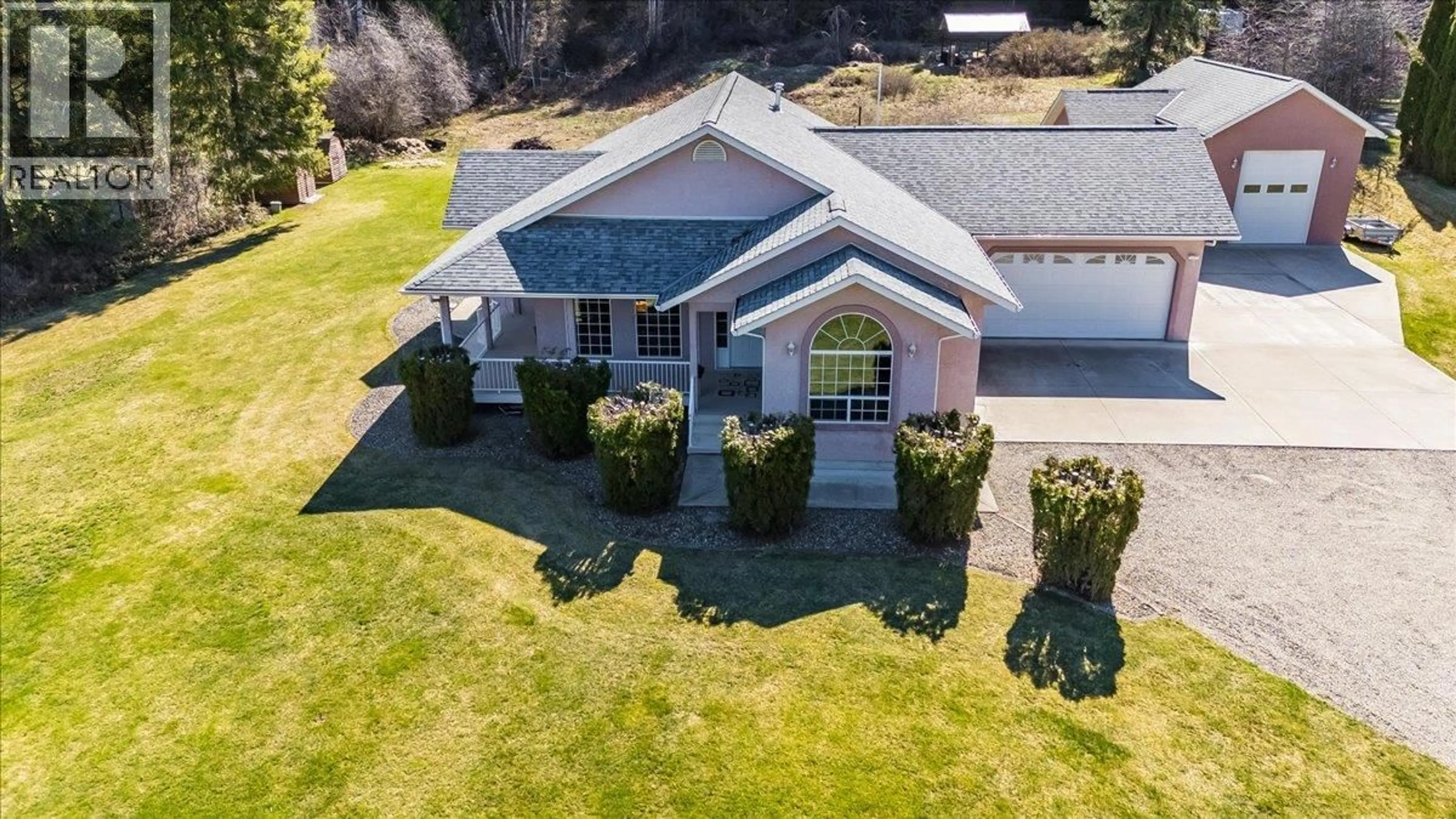 A pic from outside/outdoor area/front of a property/back of a property/a pic from drone, unknown for 1750 GREEN ROAD, Fruitvale British Columbia V0G1L1