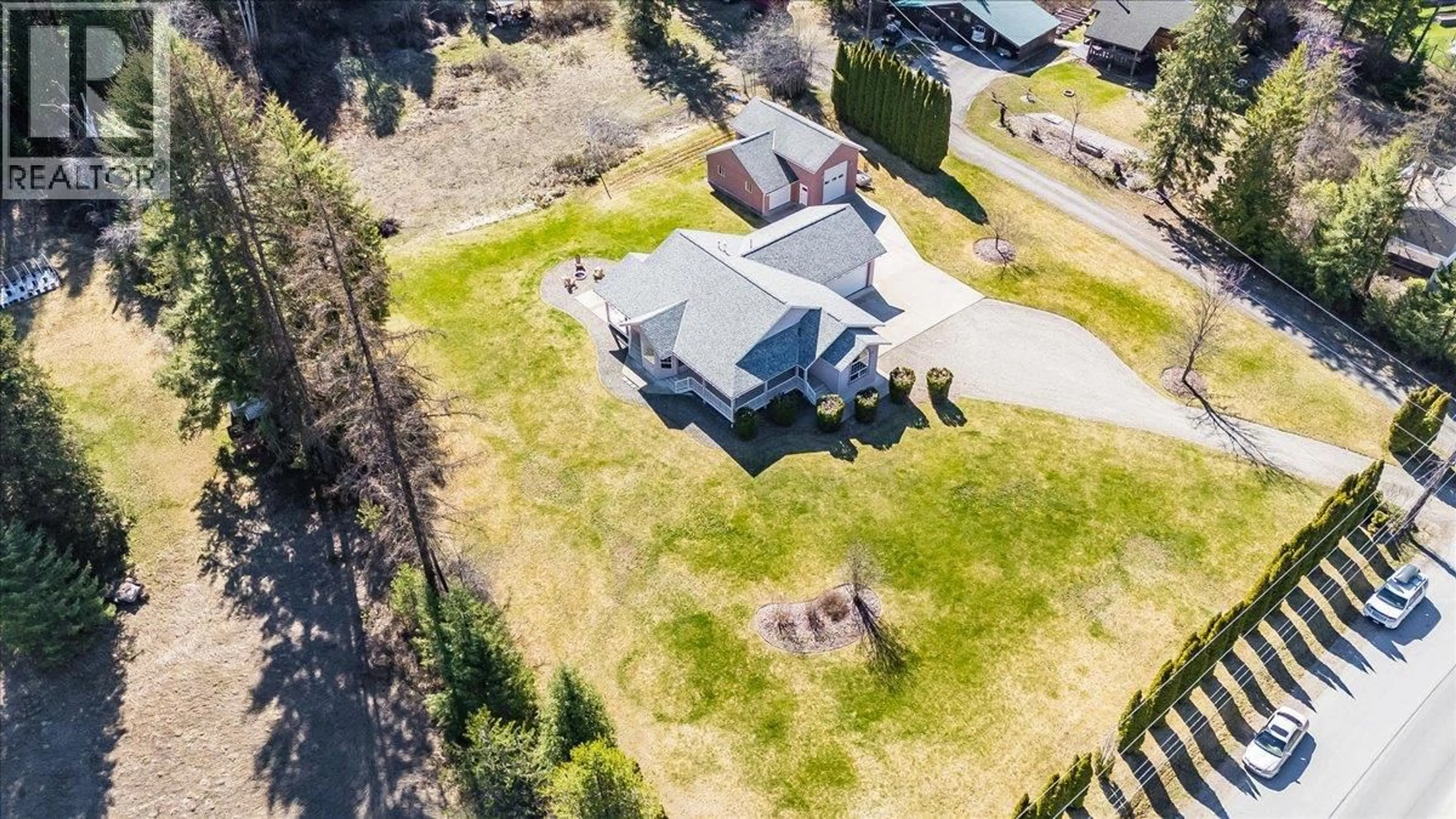 A pic from outside/outdoor area/front of a property/back of a property/a pic from drone, unknown for 1750 GREEN ROAD, Fruitvale British Columbia V0G1L1