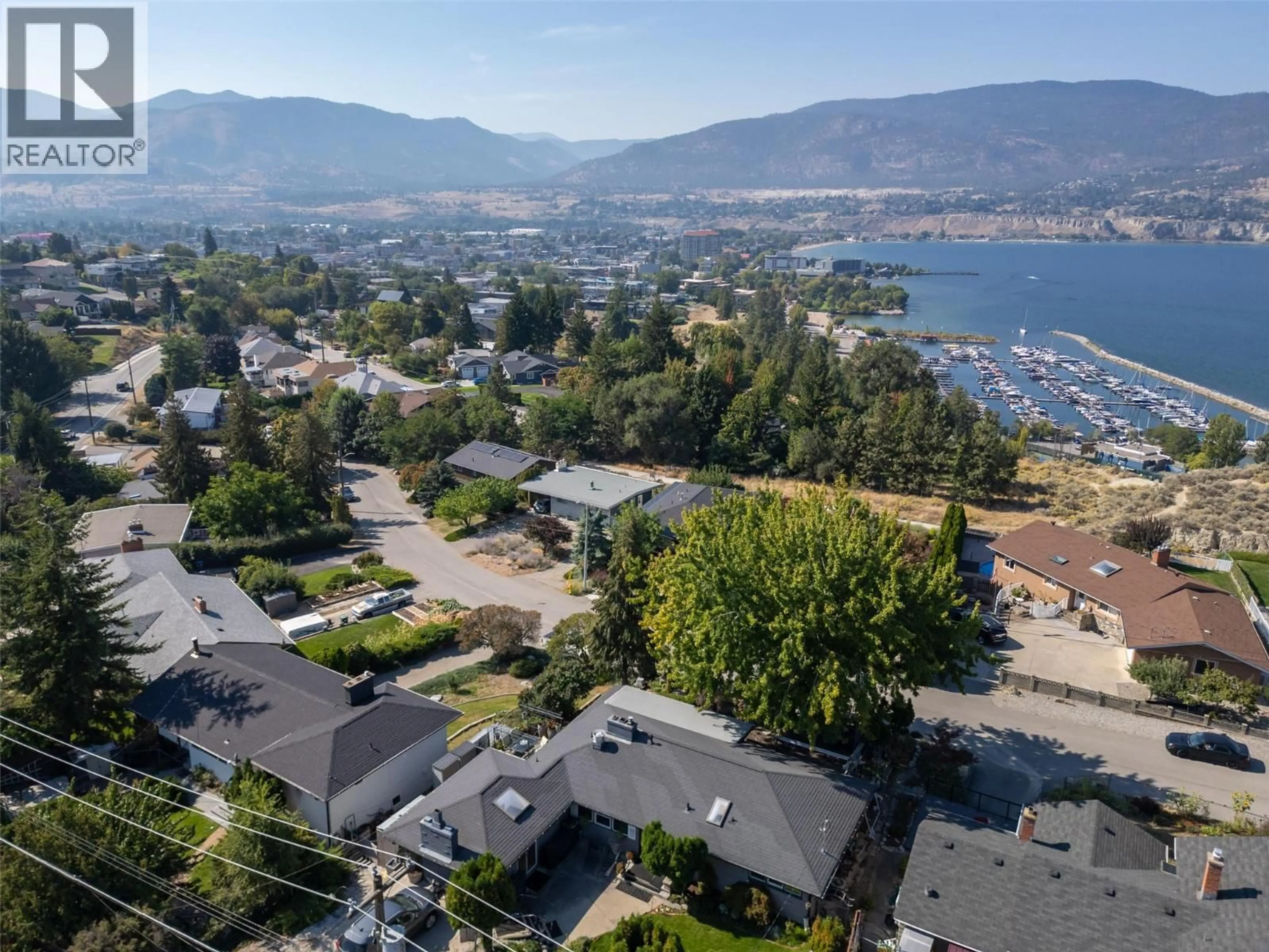 A pic from outside/outdoor area/front of a property/back of a property/a pic from drone, mountain view for 153 LOWER BENCH ROAD, Penticton British Columbia V2A1B1