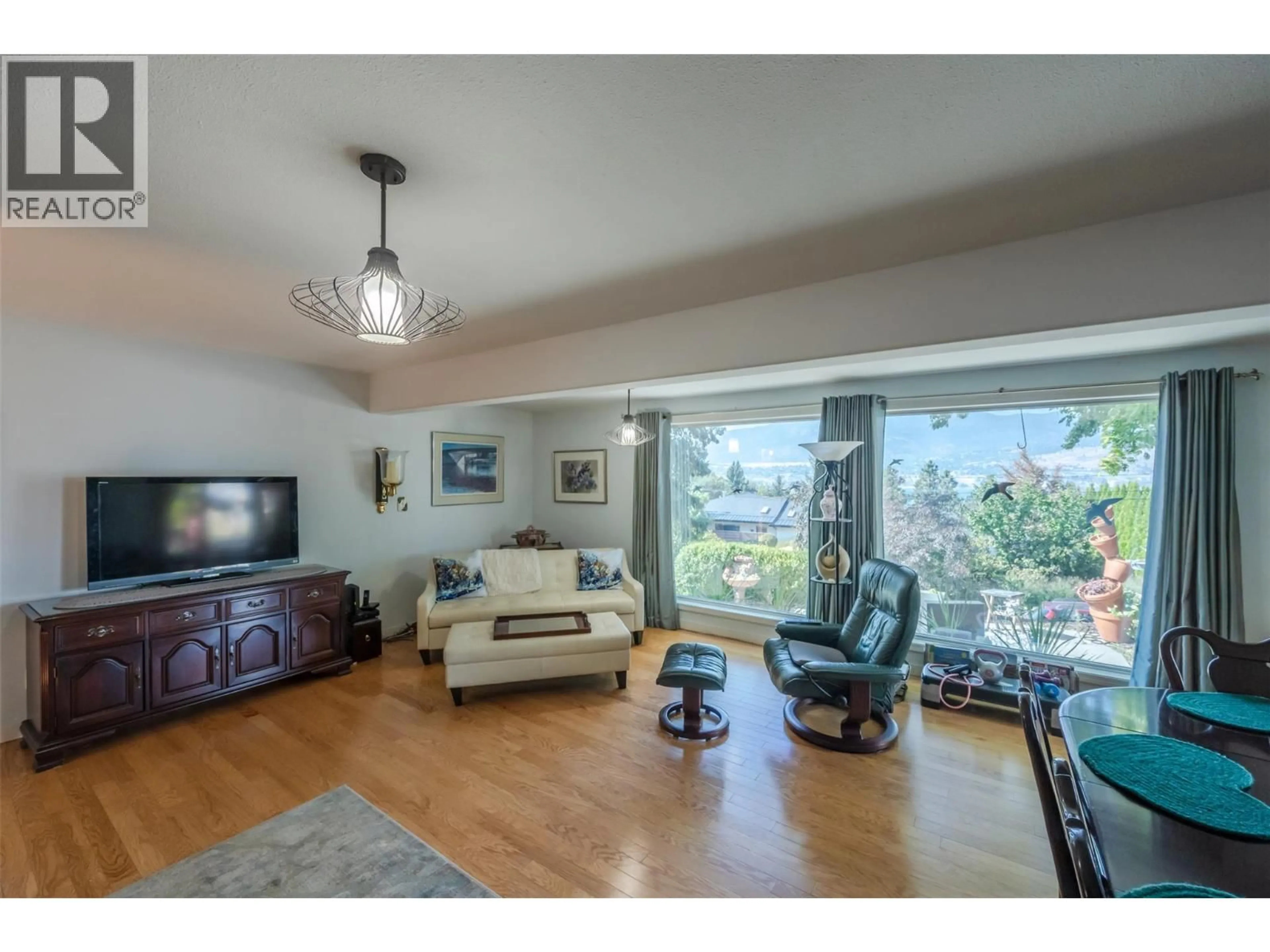 Living room with furniture, unknown for 153 LOWER BENCH ROAD, Penticton British Columbia V2A1B1