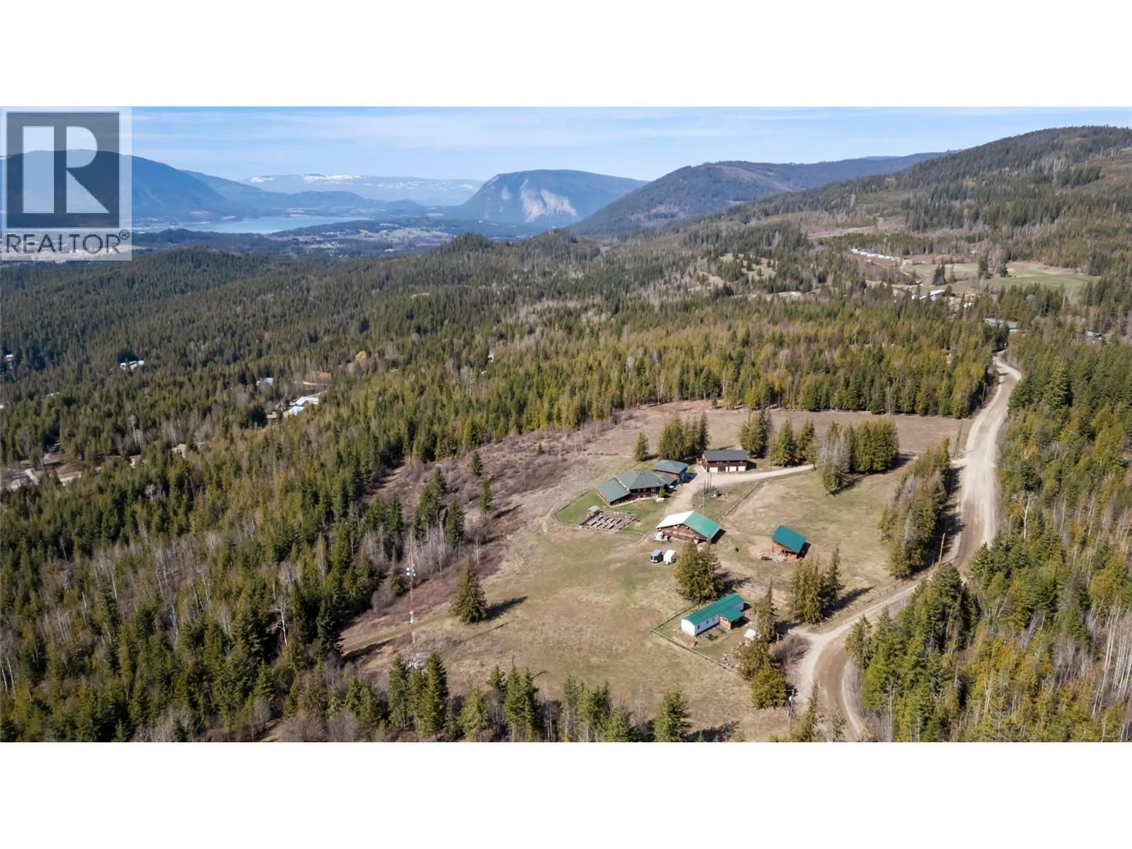 A pic from outside/outdoor area/front of a property/back of a property/a pic from drone, mountain view for 60 TIMMS ROAD, Salmon Arm British Columbia V1E2P8