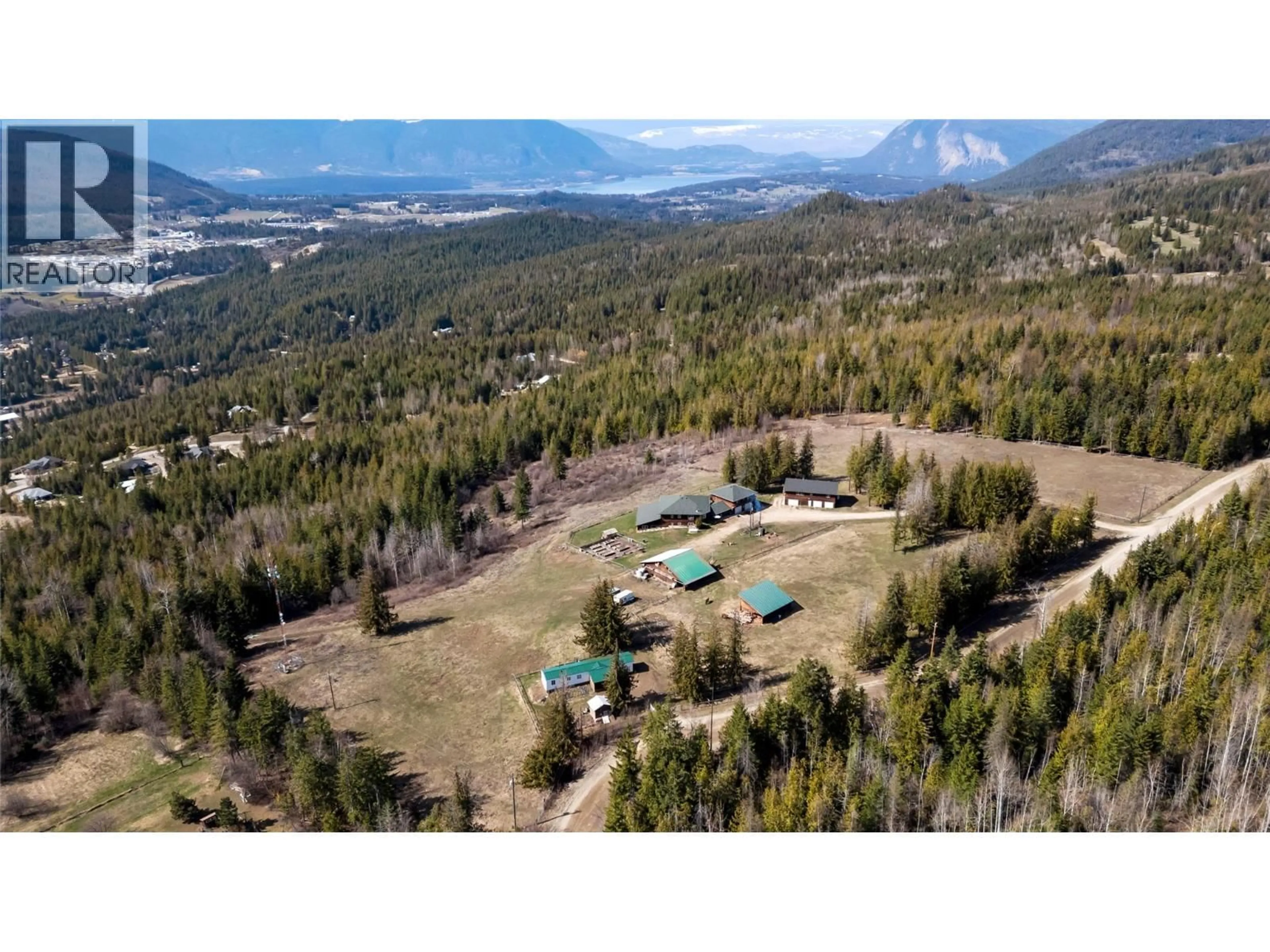 A pic from outside/outdoor area/front of a property/back of a property/a pic from drone, mountain view for 60 TIMMS ROAD, Salmon Arm British Columbia V1E2P8