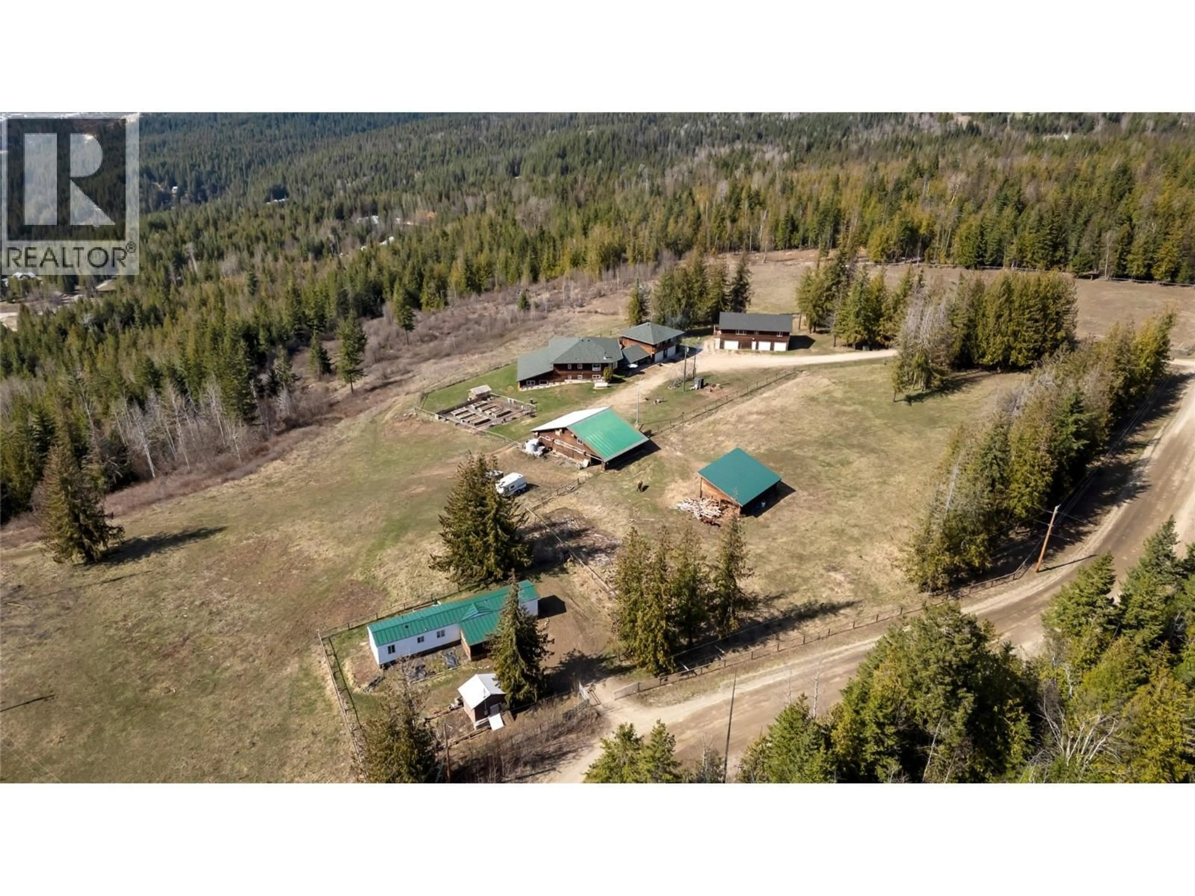 A pic from outside/outdoor area/front of a property/back of a property/a pic from drone, forest/trees view for 60 TIMMS ROAD, Salmon Arm British Columbia V1E2P8