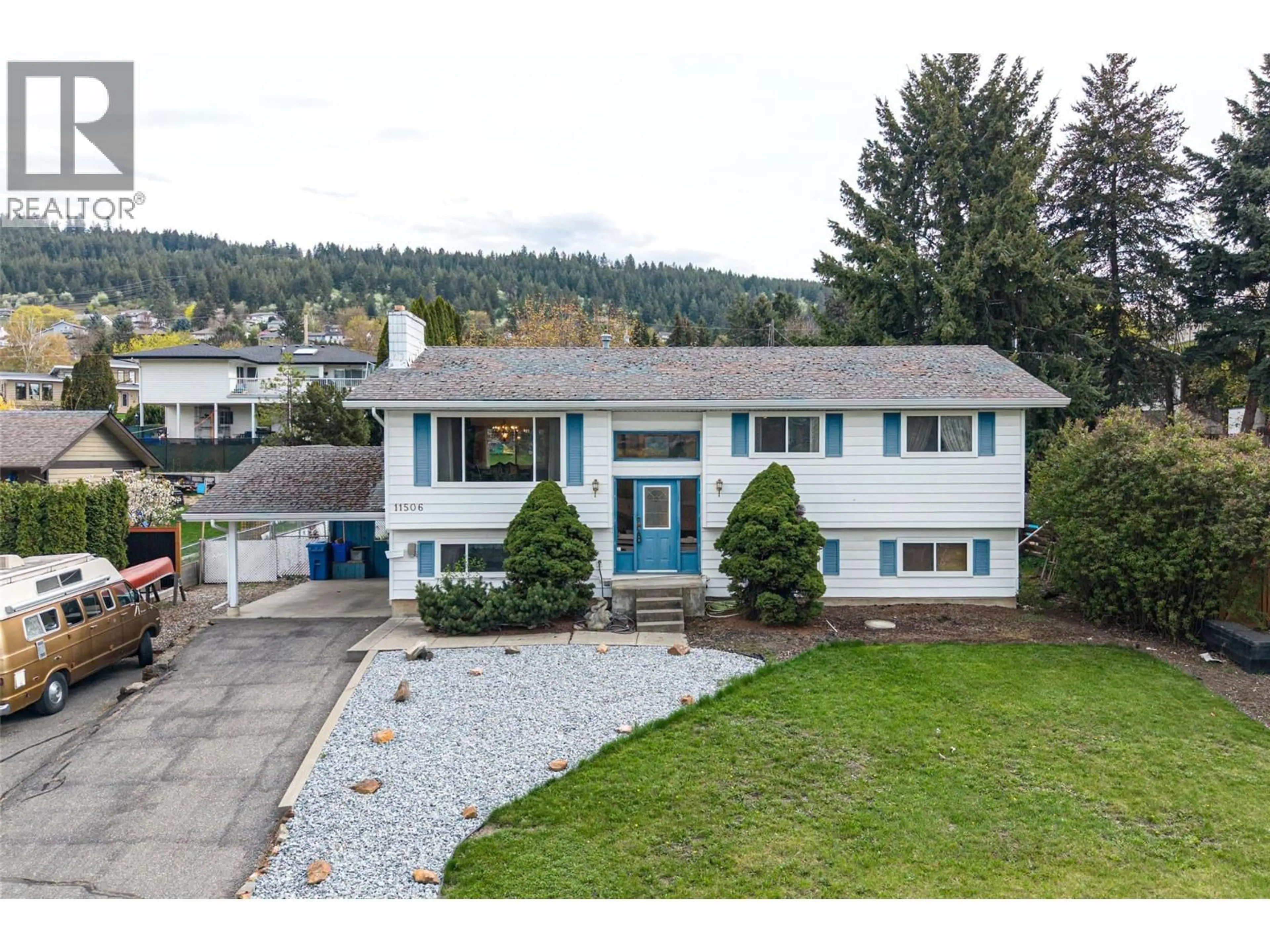 Home with vinyl exterior material, mountain view for 11506 BRIAR DRIVE, Coldstream British Columbia V1B2A5