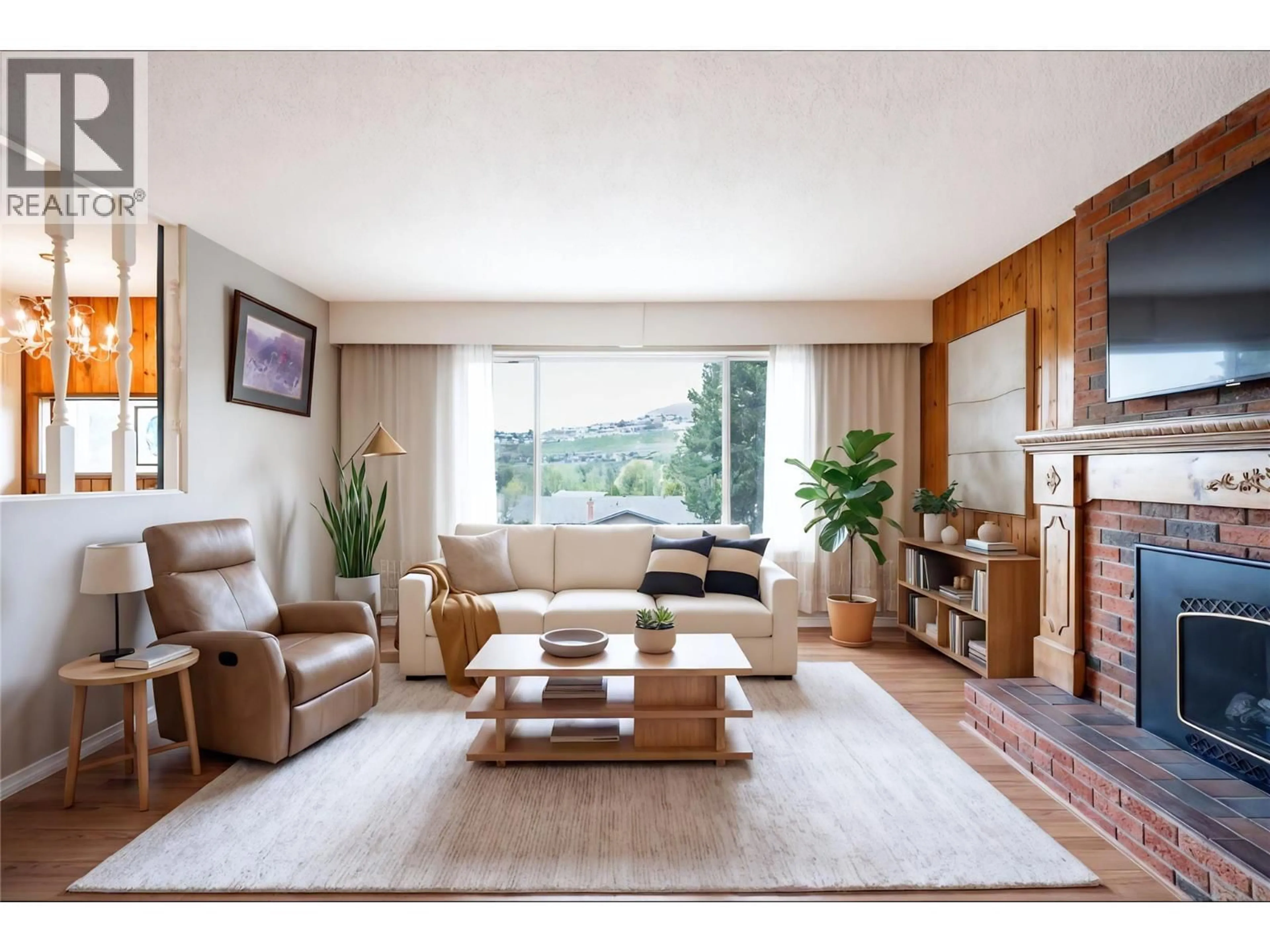 Living room with furniture, wood/laminate floor for 11506 BRIAR DRIVE, Coldstream British Columbia V1B2A5