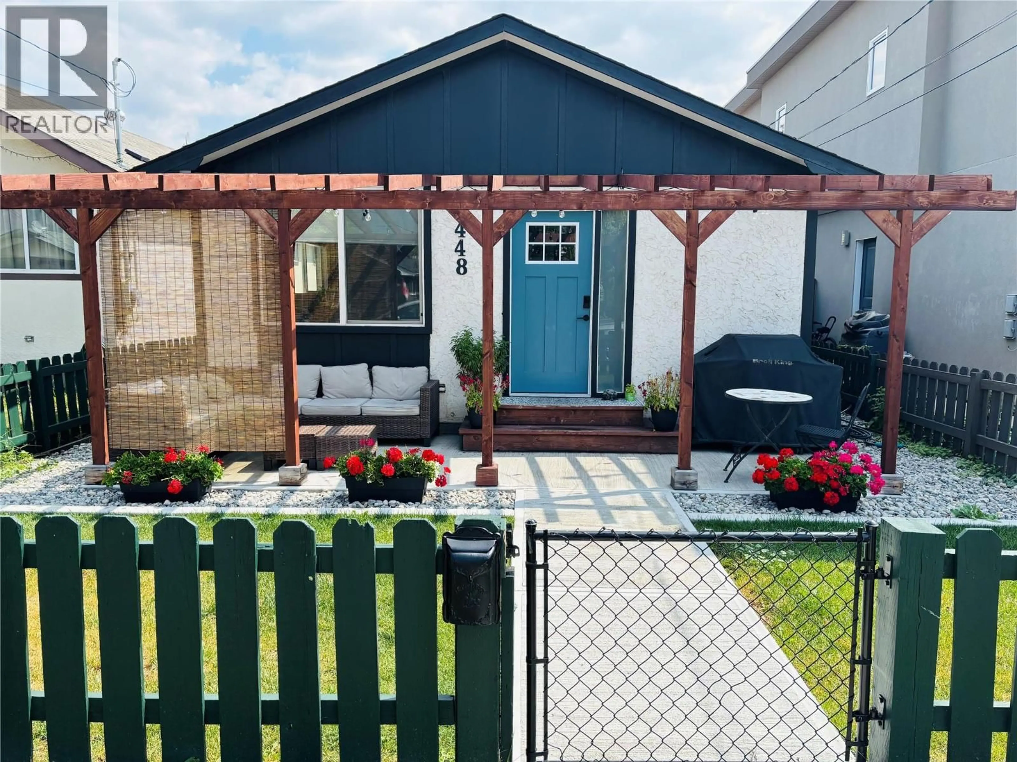 Home with vinyl exterior material, street for 448 CARIBOU STREET, Penticton British Columbia V2A5W6