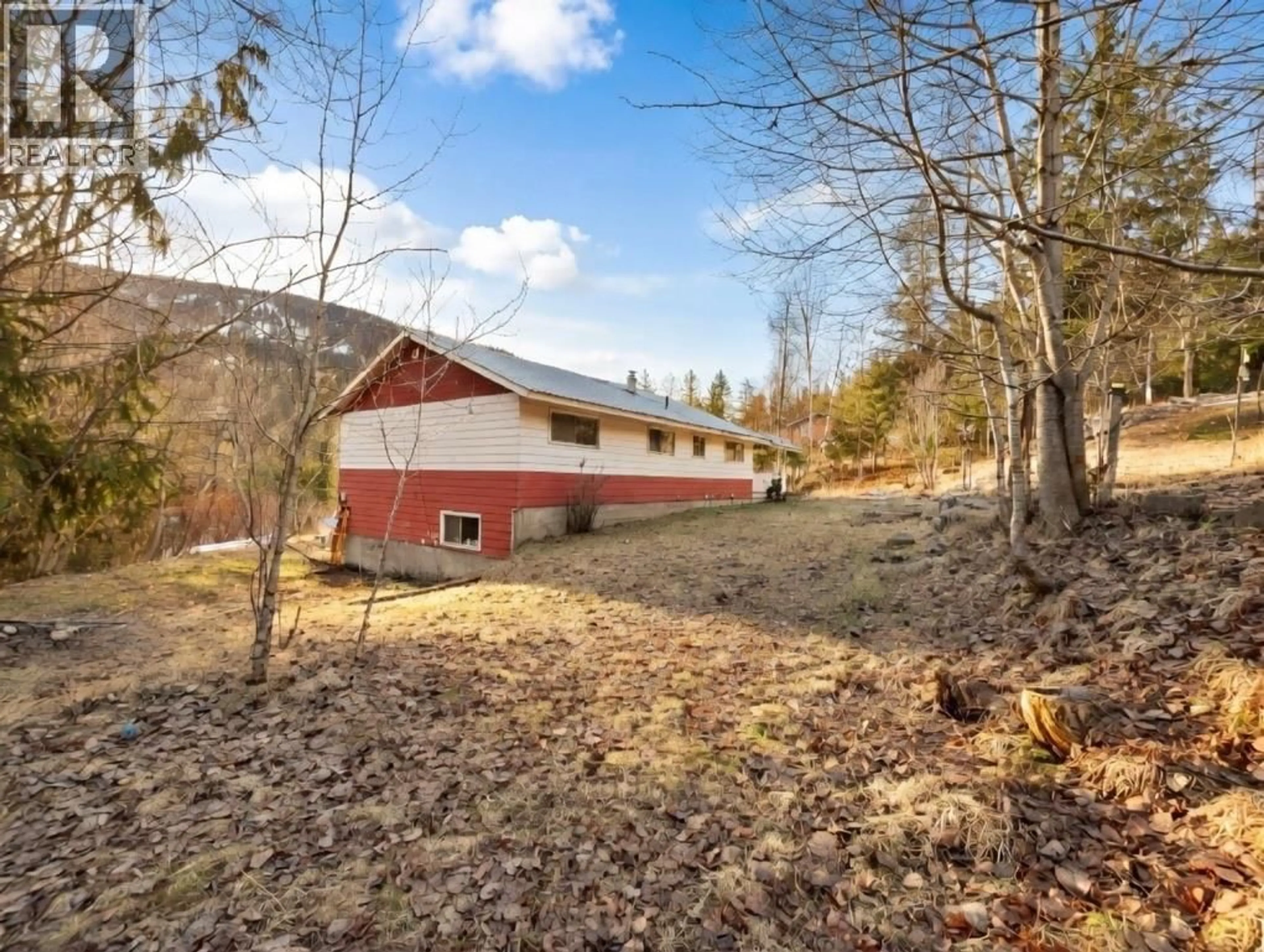 A pic from outside/outdoor area/front of a property/back of a property/a pic from drone, forest/trees view for 2612 SILVER KING ROAD, Nelson British Columbia V1L1C9