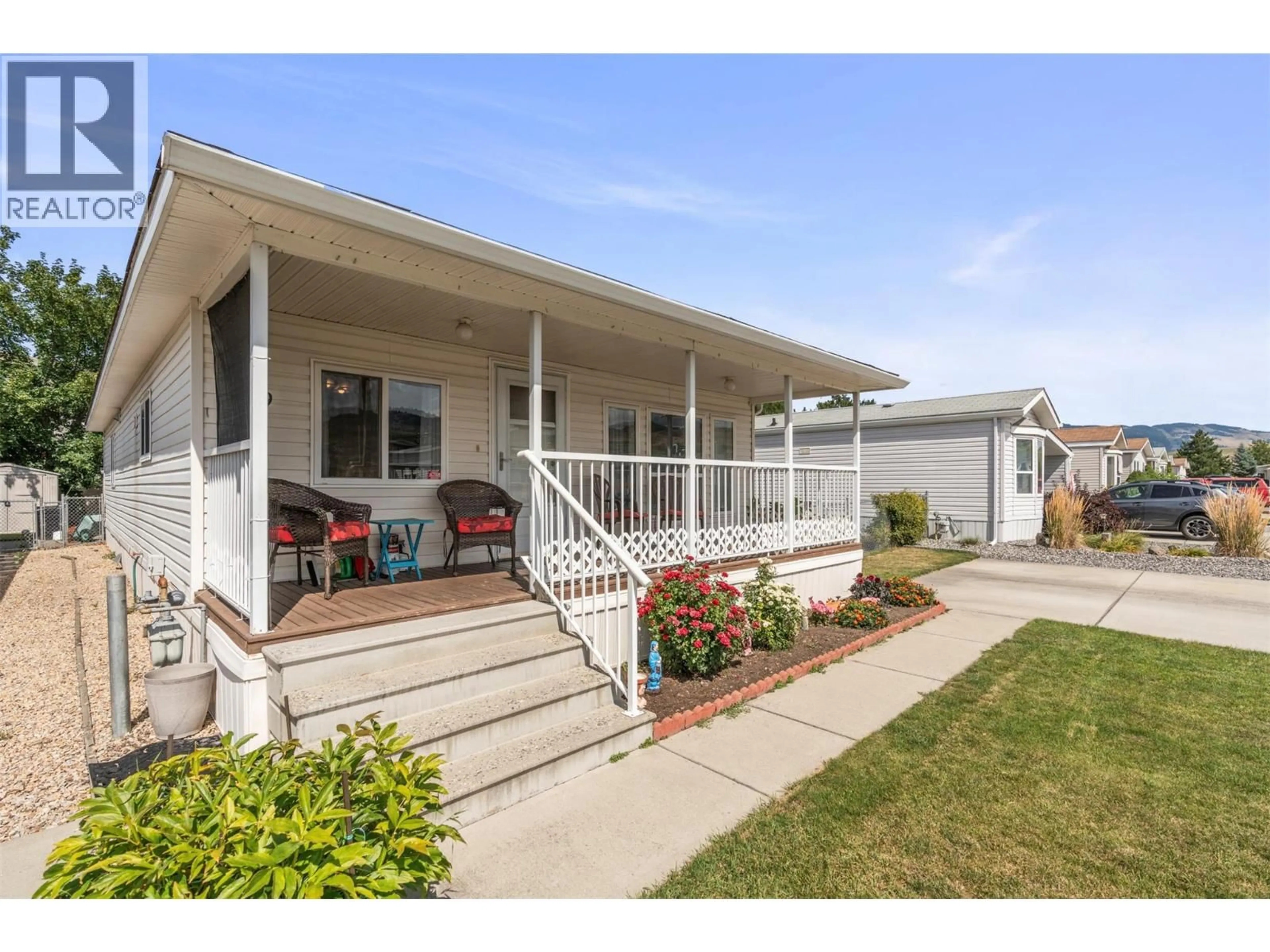 Home with vinyl exterior material, street for 9 - 6688 TRONSON ROAD, Vernon British Columbia V1H1R9