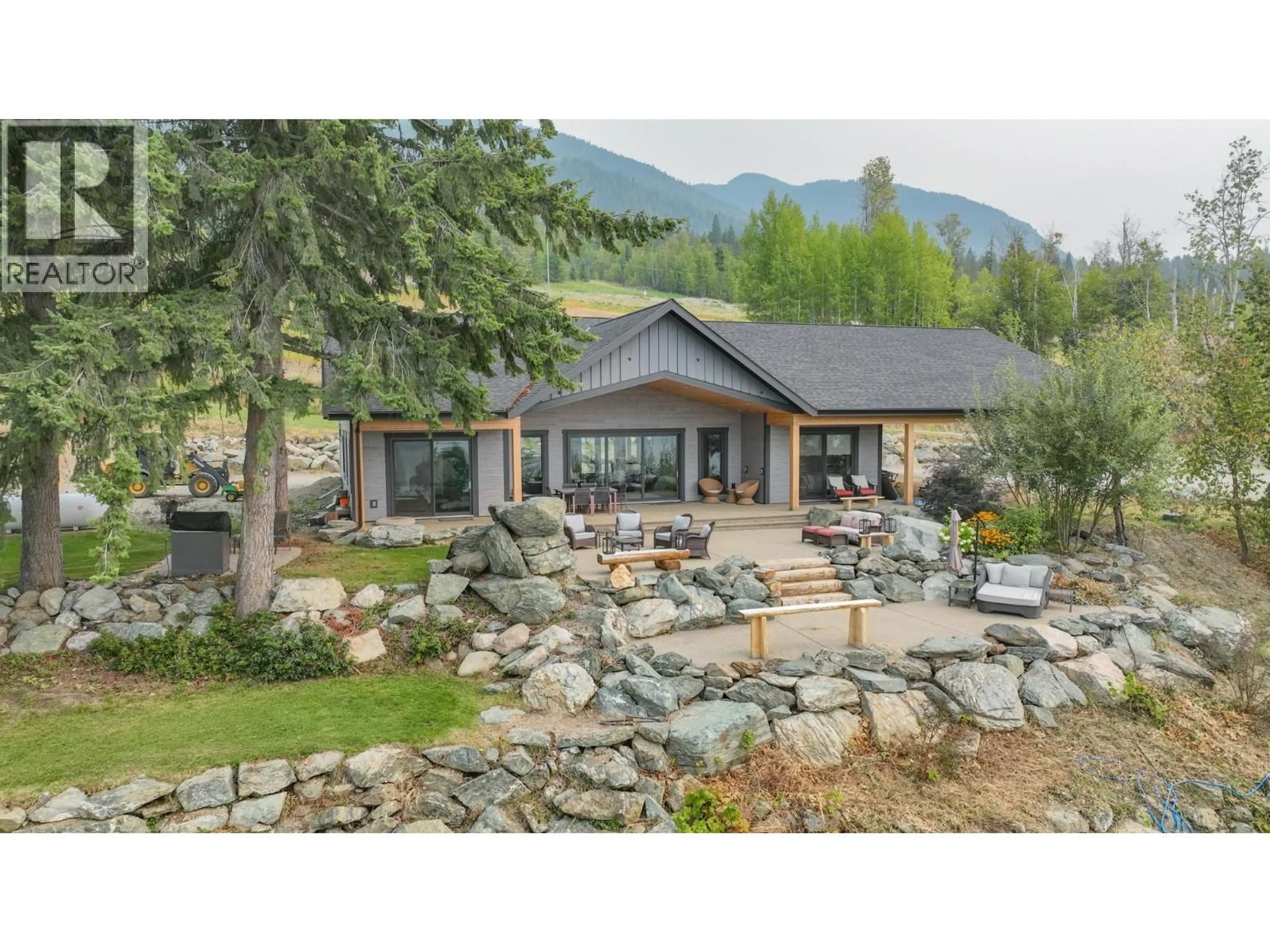 Home with vinyl exterior material, mountain view for 7500 LONNEKE TRAIL, Anglemont British Columbia V0E1M8