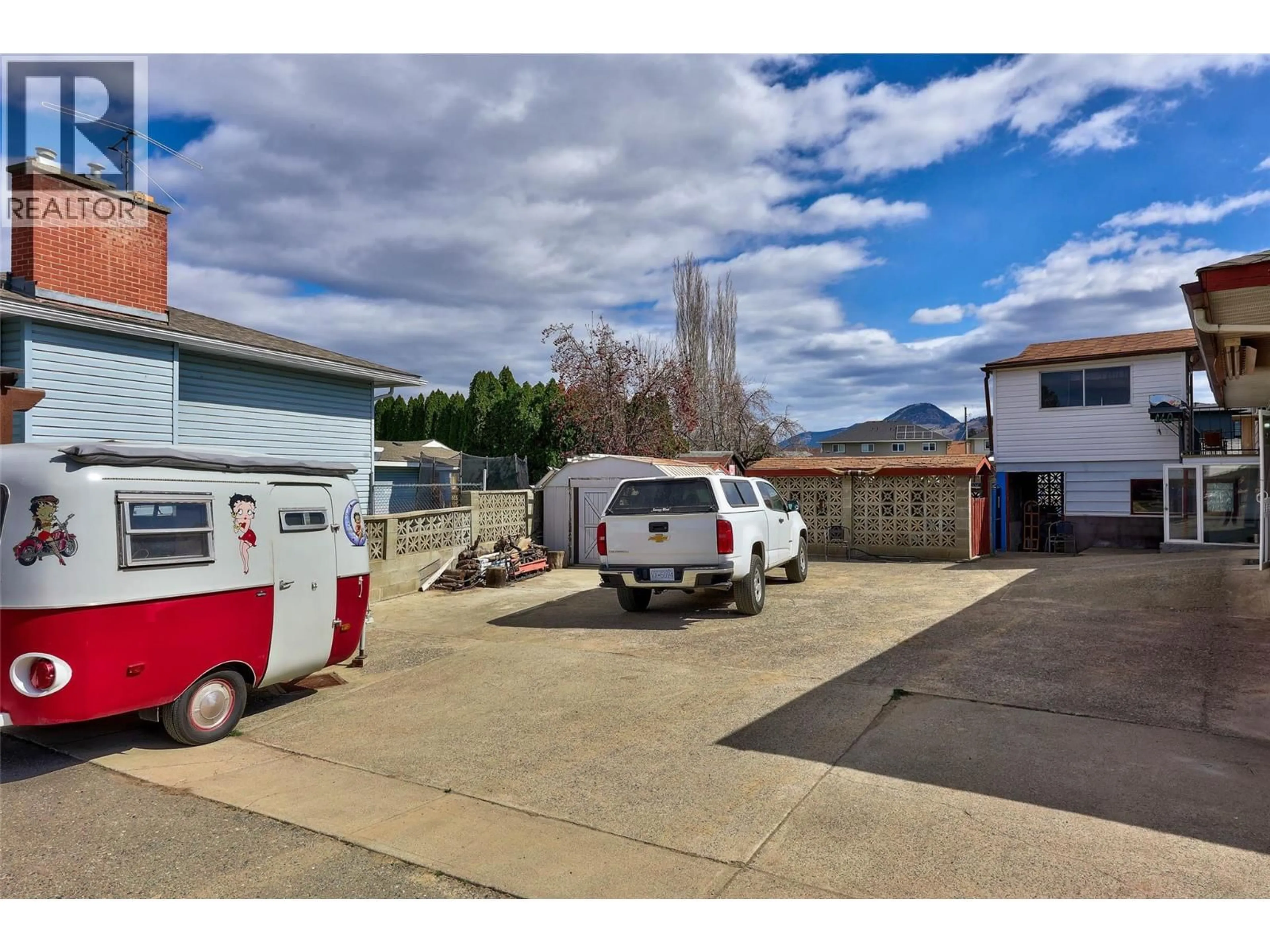 A pic from outside/outdoor area/front of a property/back of a property/a pic from drone, street for 2248 TRANQUILLE ROAD, Kamloops British Columbia V2B3N2