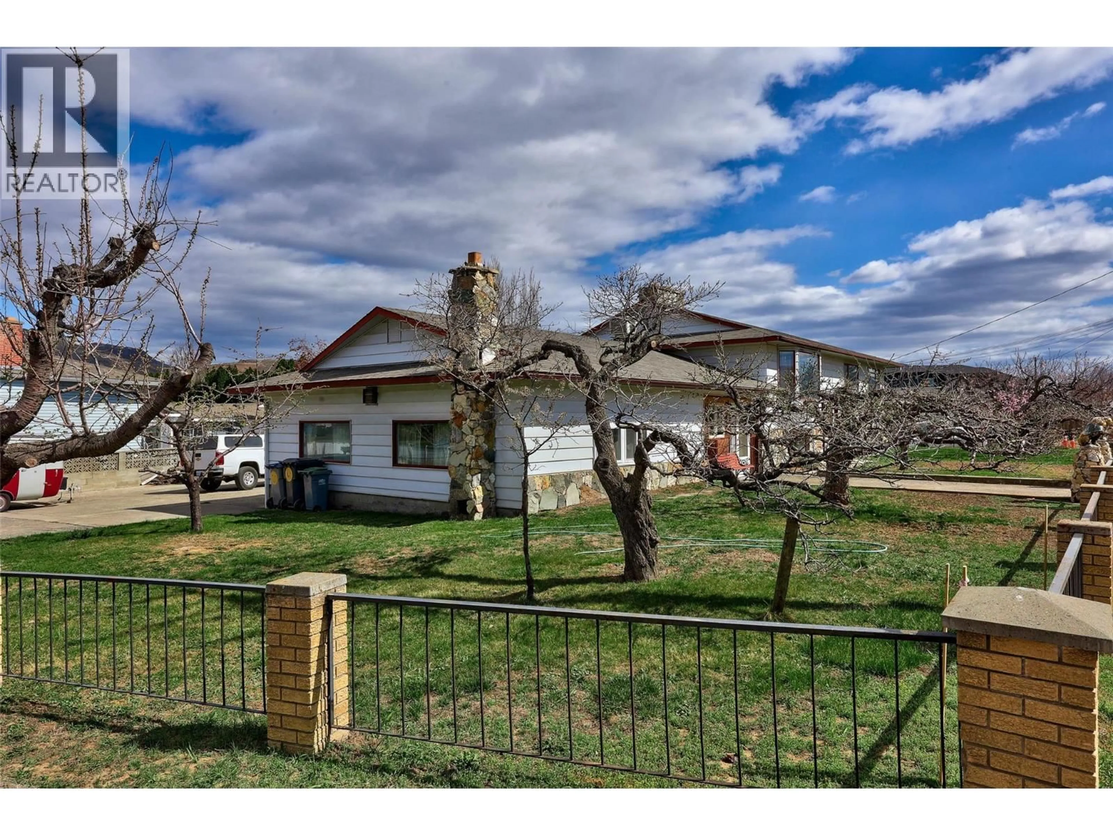 A pic from outside/outdoor area/front of a property/back of a property/a pic from drone, street for 2248 TRANQUILLE ROAD, Kamloops British Columbia V2B3N2