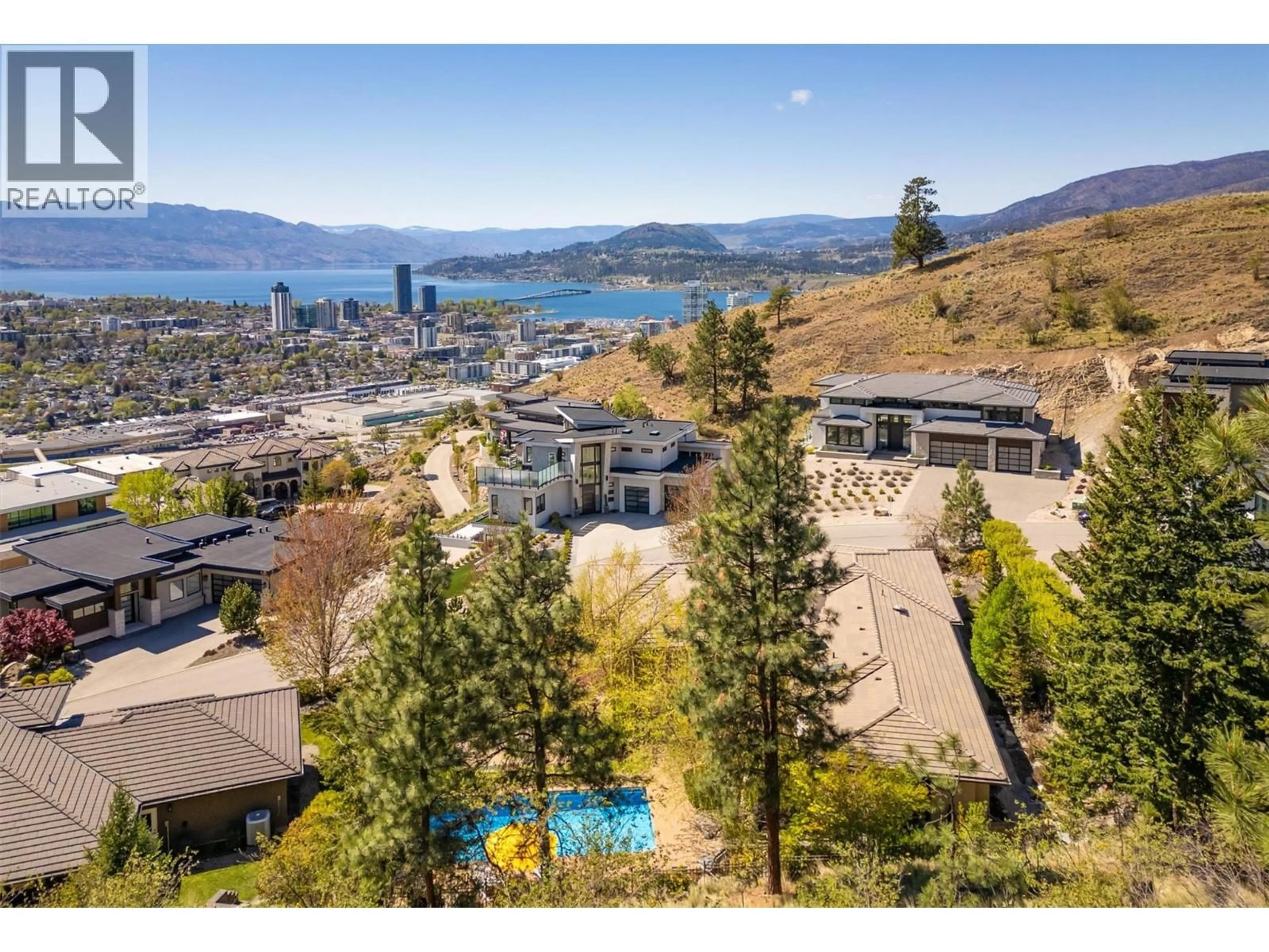 A pic from outside/outdoor area/front of a property/back of a property/a pic from drone, water/lake/river/ocean view for 741 PINEHAVEN COURT, Kelowna British Columbia V1V2Y3