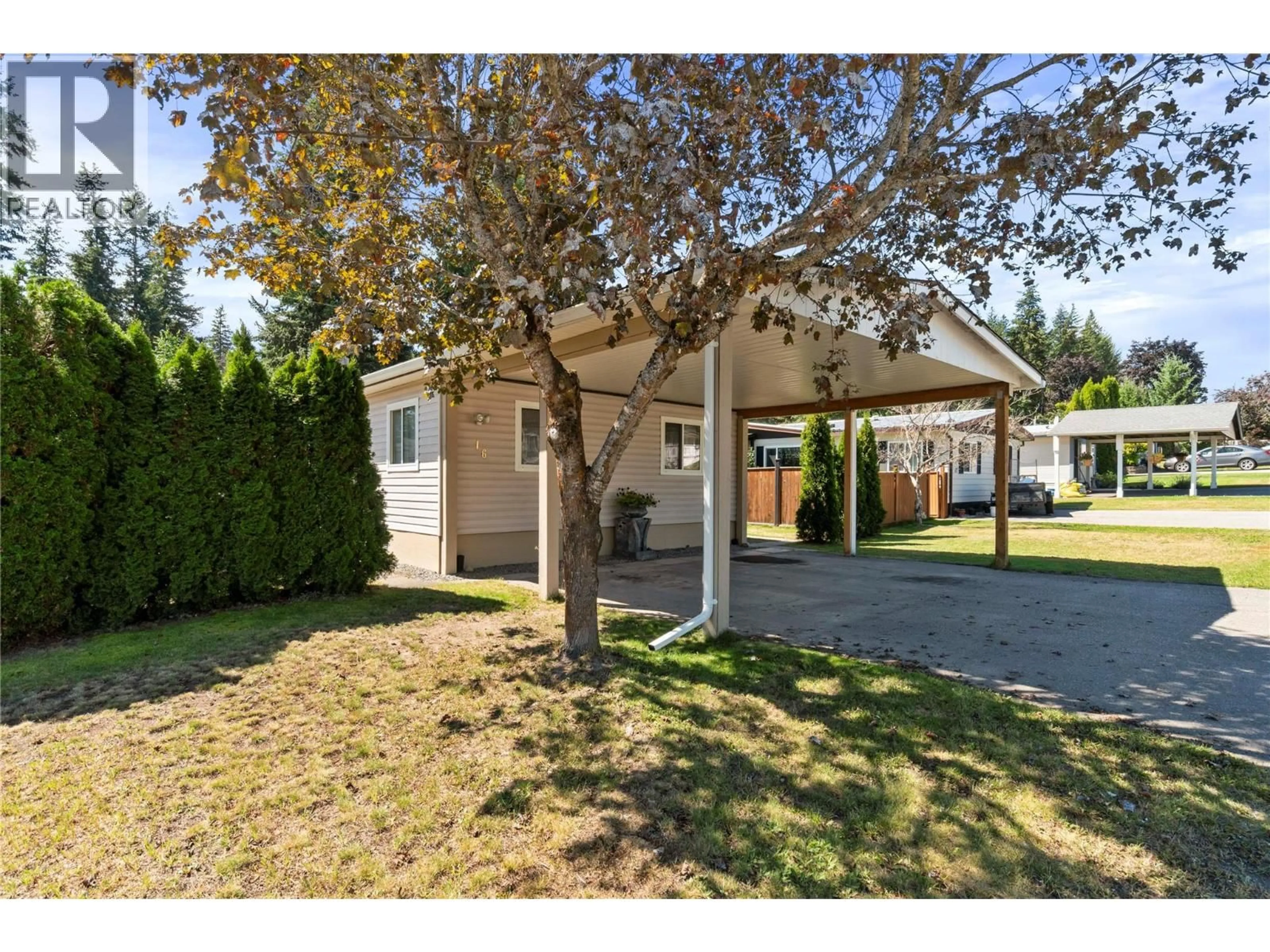 A pic from outside/outdoor area/front of a property/back of a property/a pic from drone, street for 16 - 1361 30 STREET SOUTHEAST, Salmon Arm British Columbia V1E2N4
