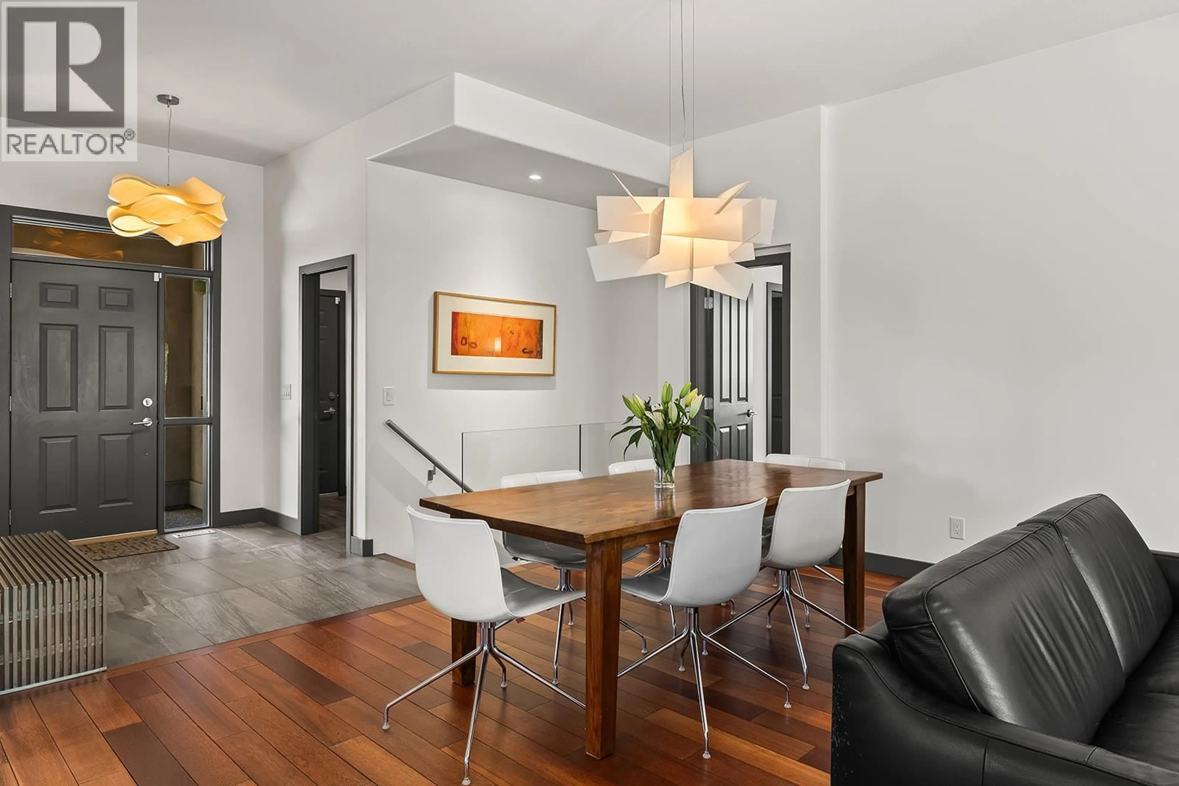 Dining room, wood/laminate floor for 4150 GALLAGHERS FOREST SOUTH, Kelowna British Columbia V1W5E4
