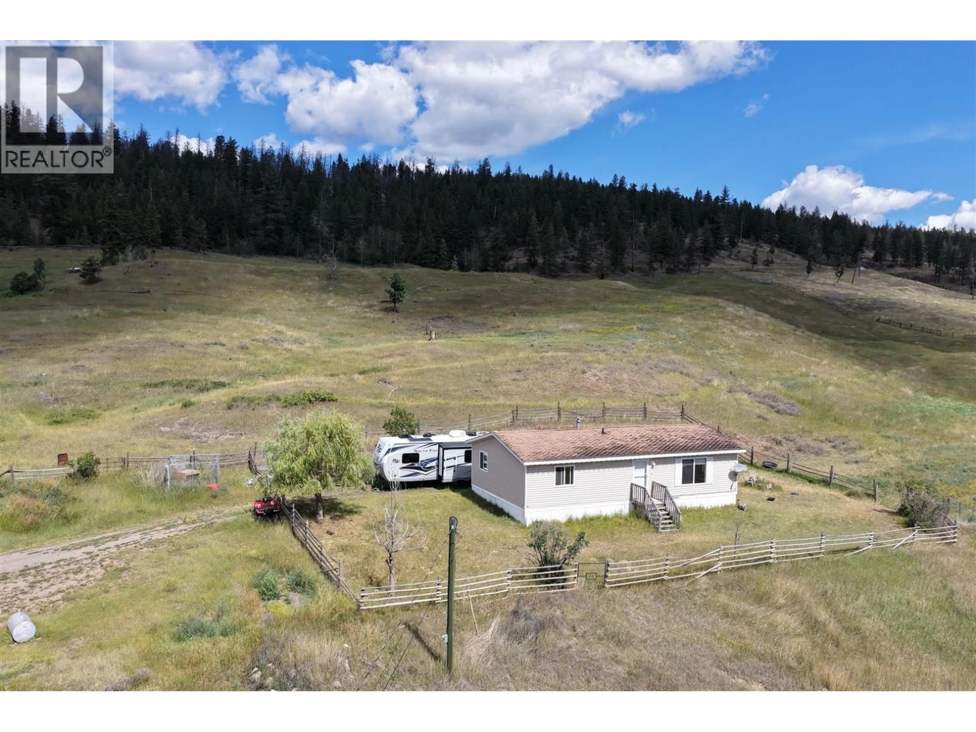 A pic from outside/outdoor area/front of a property/back of a property/a pic from drone, mountain view for 3850 LOON LAKE ROAD, Loon Lake British Columbia V0K2E1