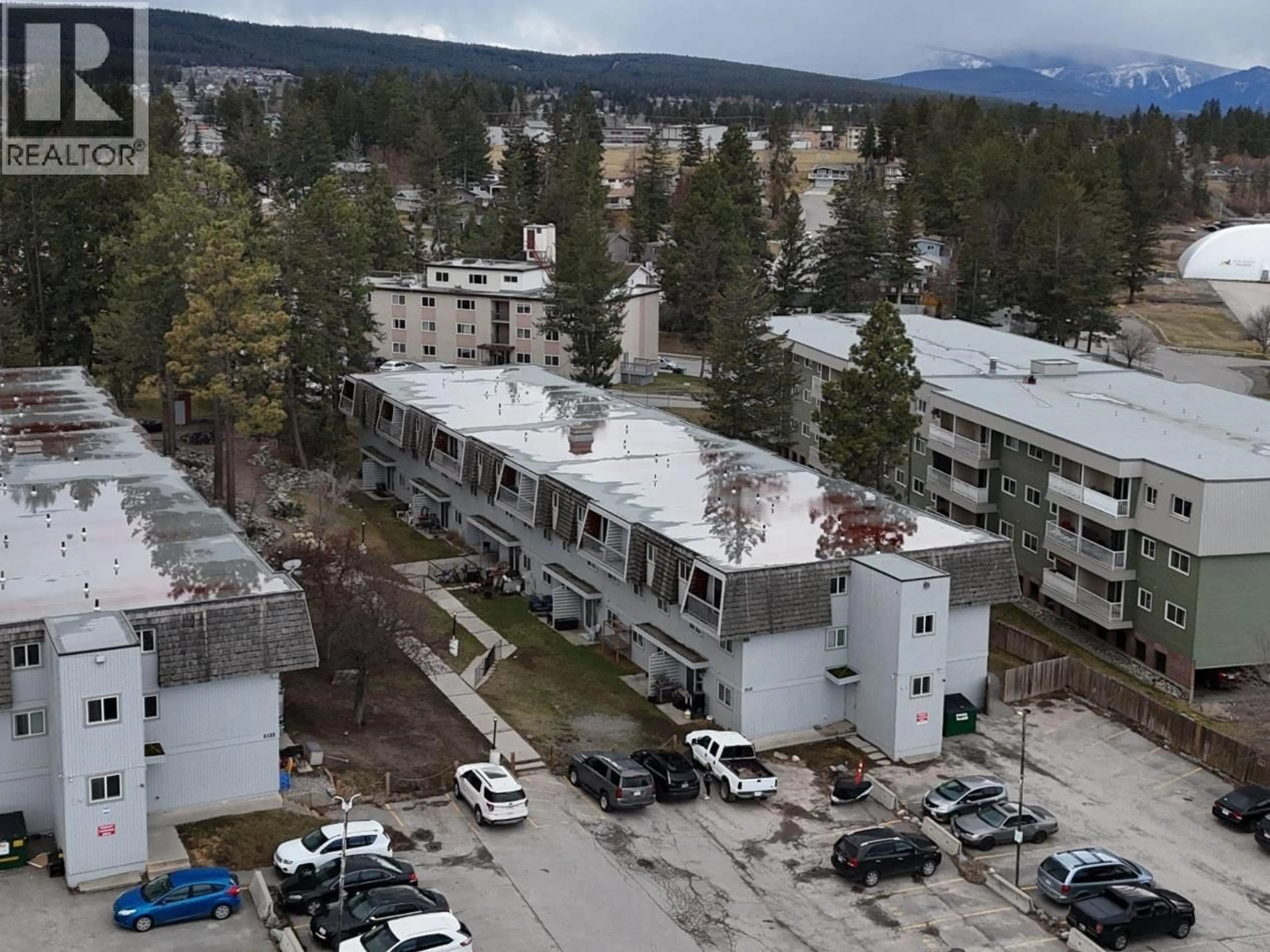 A pic from outside/outdoor area/front of a property/back of a property/a pic from drone, mountain view for 207 - 2117 2ND STREET NORTH, Cranbrook British Columbia V1C3L4