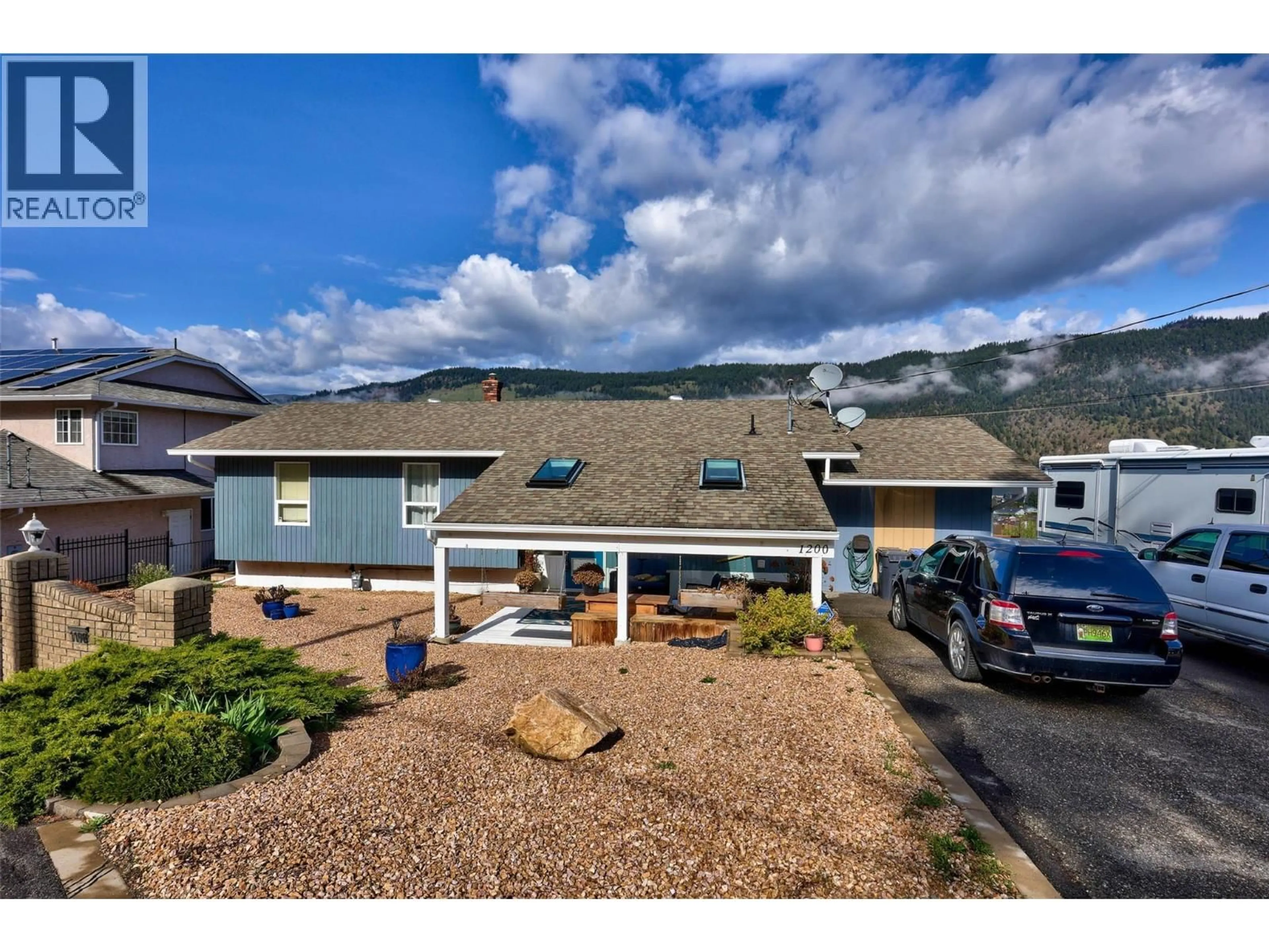 A pic from outside/outdoor area/front of a property/back of a property/a pic from drone, mountain view for 1200 BAY DRIVE, Chase British Columbia V0E1M0