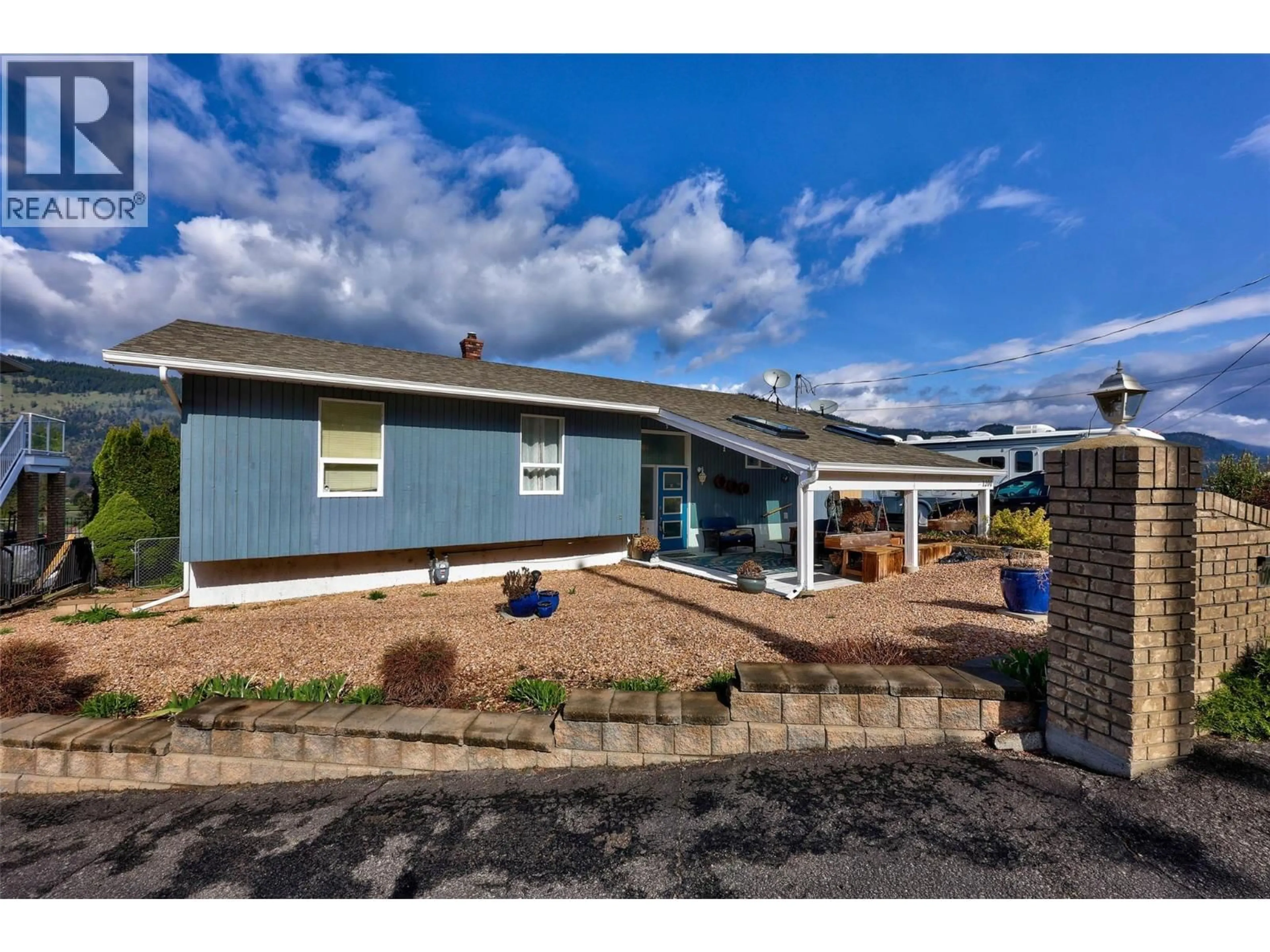 Home with vinyl exterior material, street for 1200 BAY DRIVE, Chase British Columbia V0E1M0