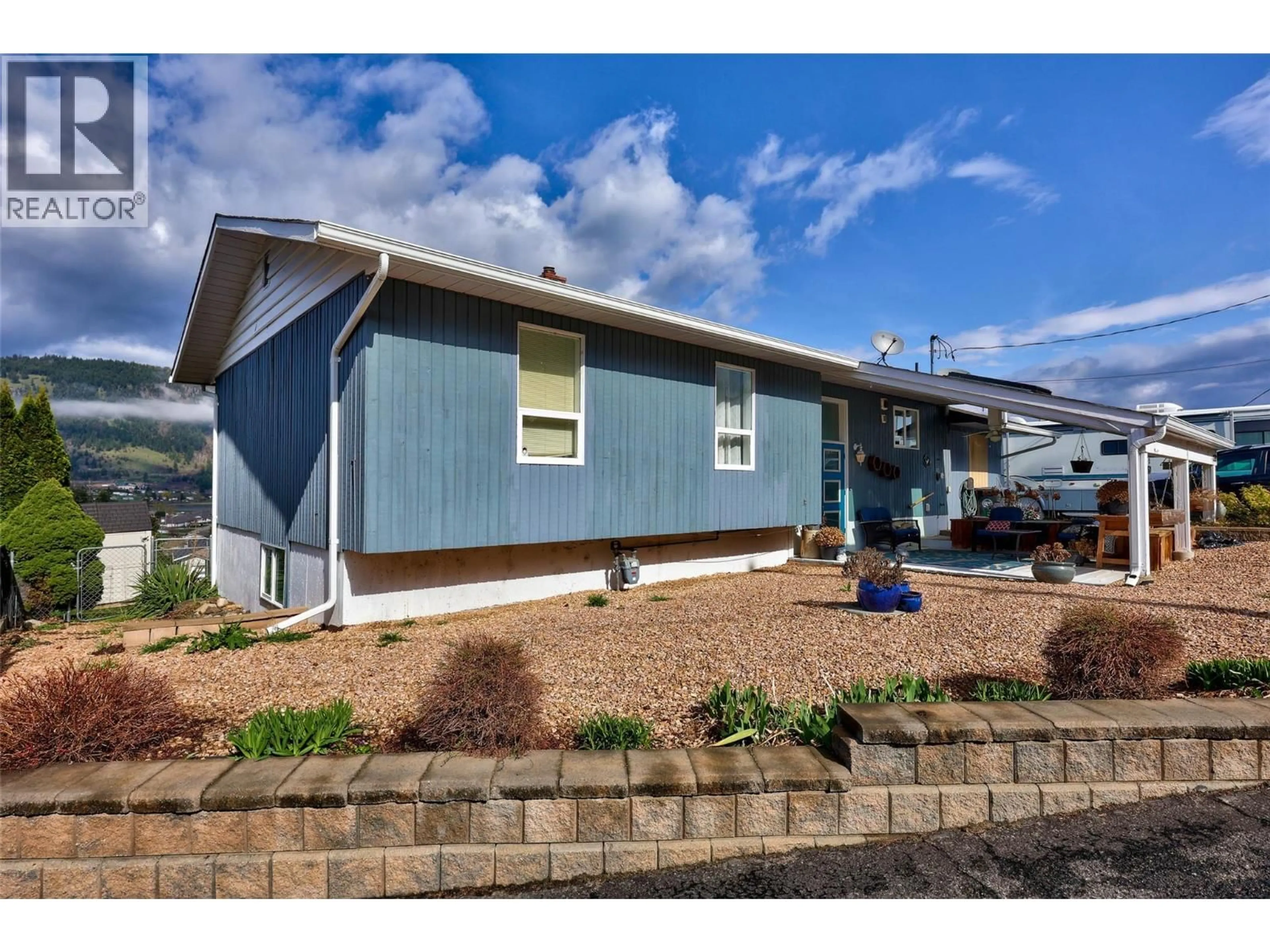 Home with vinyl exterior material, street for 1200 BAY DRIVE, Chase British Columbia V0E1M0