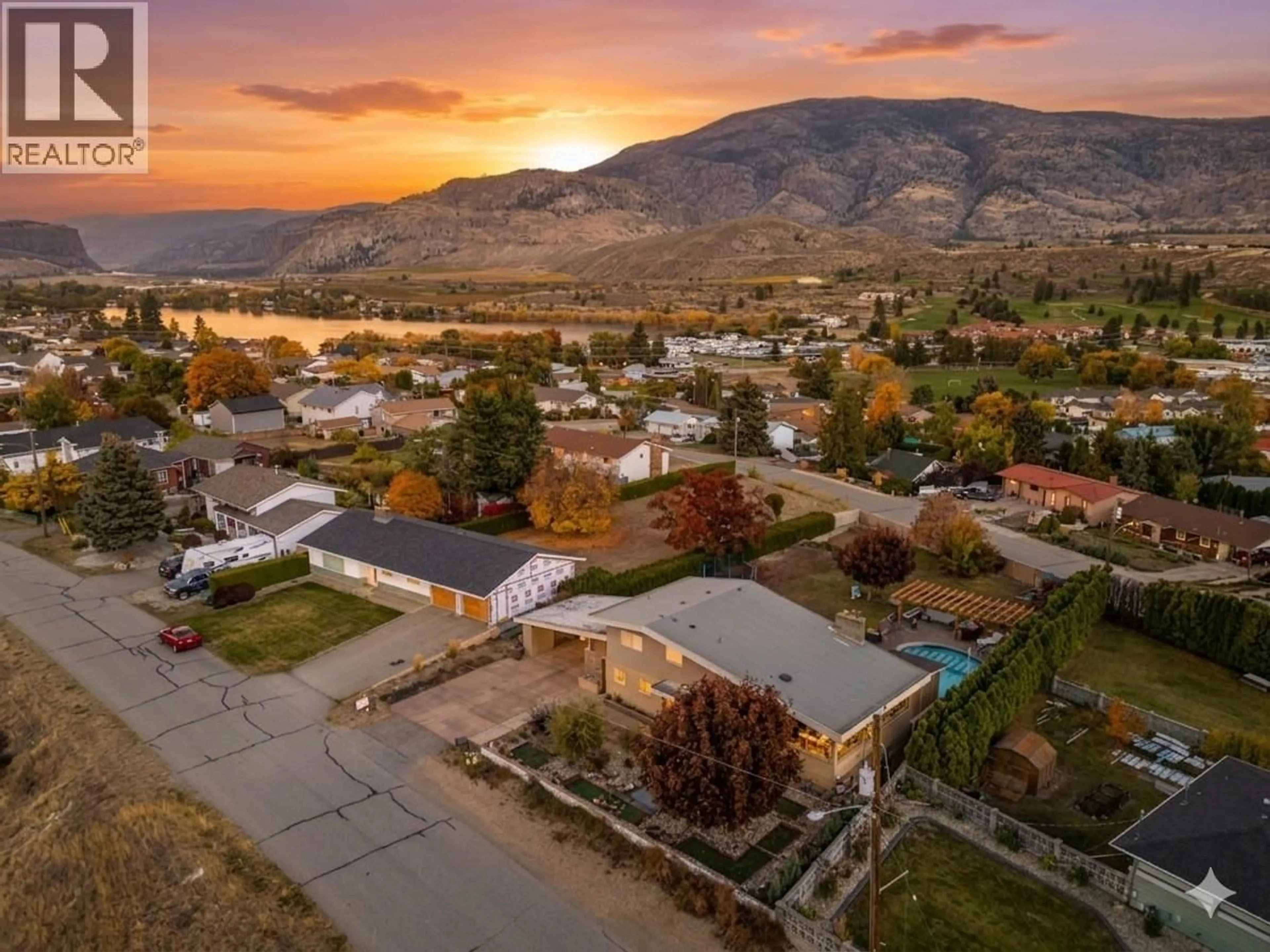 A pic from outside/outdoor area/front of a property/back of a property/a pic from drone, mountain view for 6521 BELLEVUE DRIVE, Oliver British Columbia V0H1T4