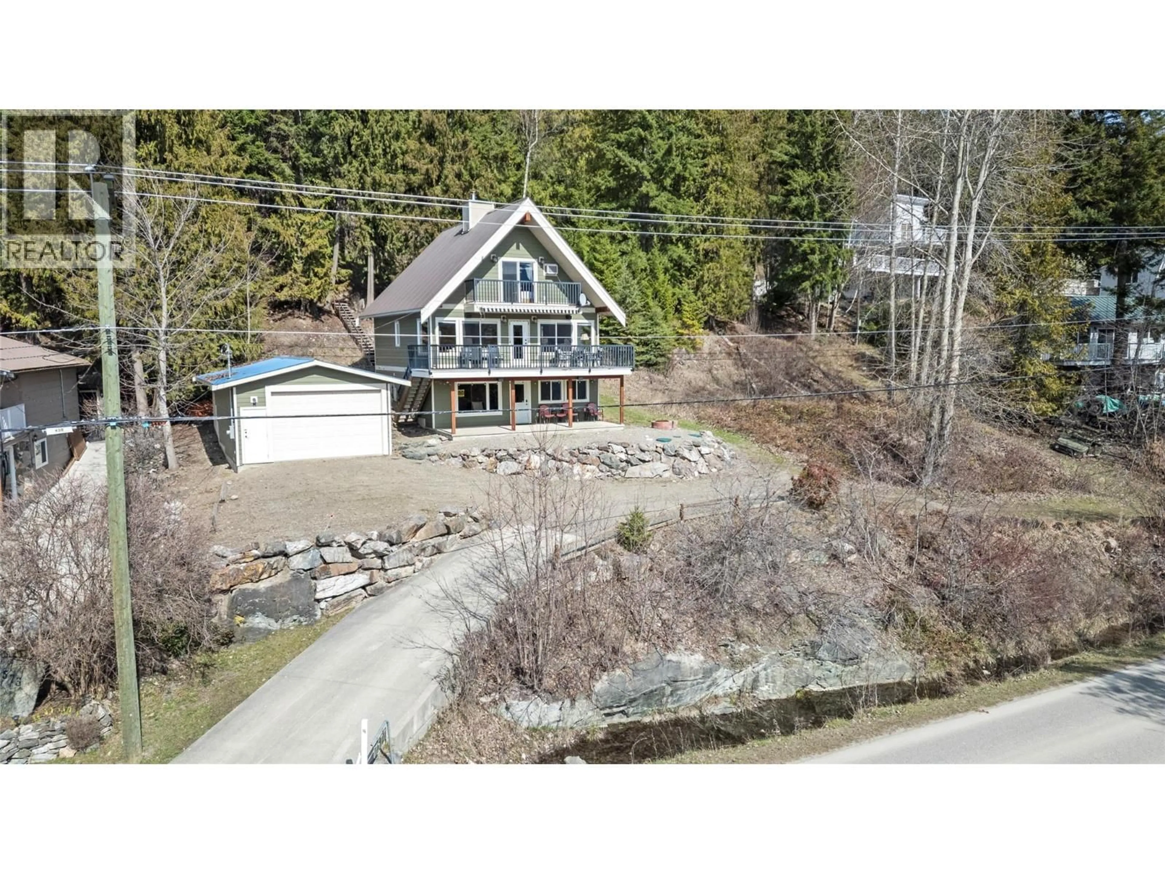 A pic from outside/outdoor area/front of a property/back of a property/a pic from drone, water/lake/river/ocean view for 7577 SQUILAX ANGLEMONT ROAD, Anglemont British Columbia V0E1M8