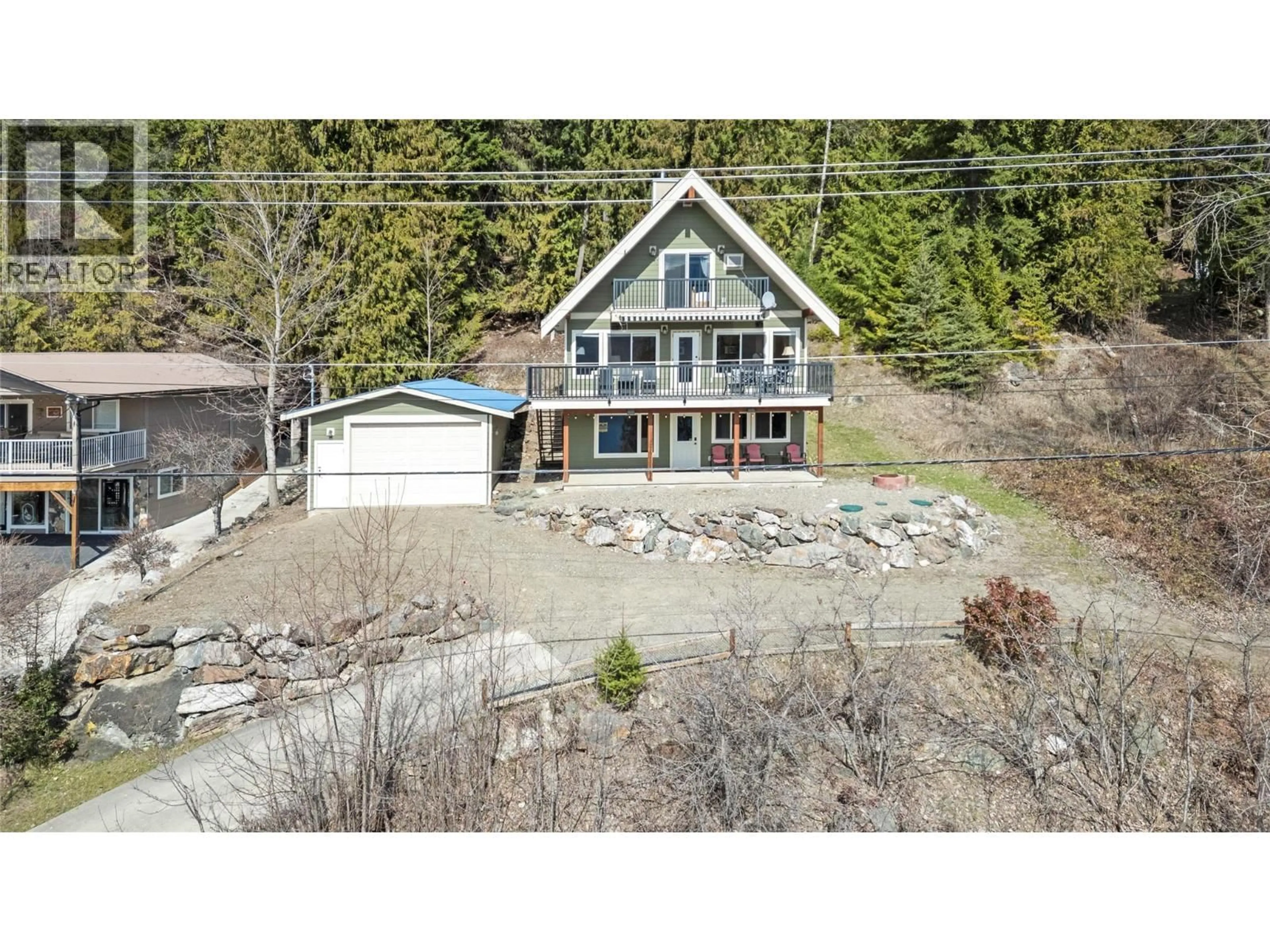 A pic from outside/outdoor area/front of a property/back of a property/a pic from drone, water/lake/river/ocean view for 7577 SQUILAX ANGLEMONT ROAD, Anglemont British Columbia V0E1M8