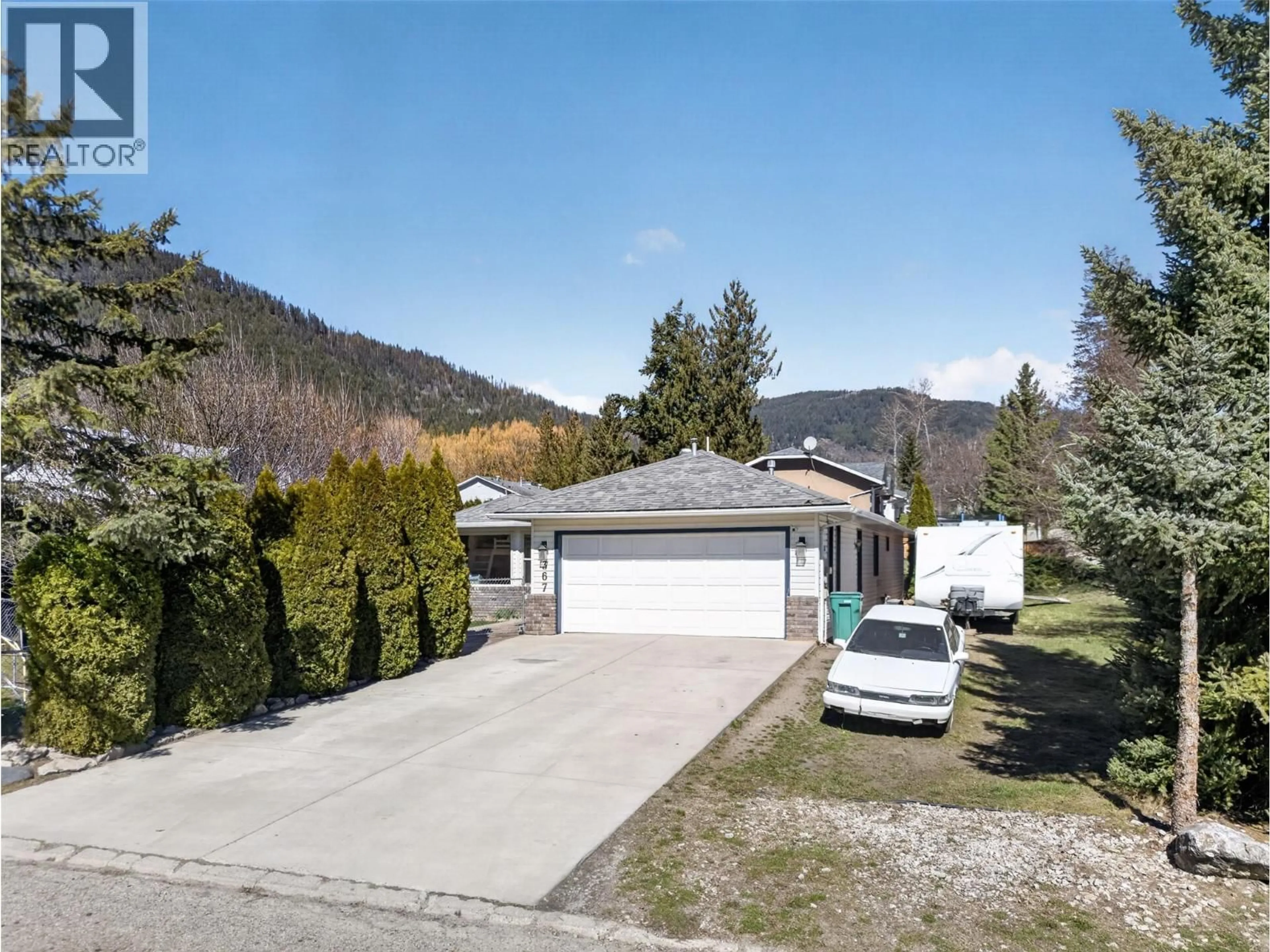 A pic from outside/outdoor area/front of a property/back of a property/a pic from drone, street for 2367 CEDAR RIDGE STREET, Lumby British Columbia V0E2G5
