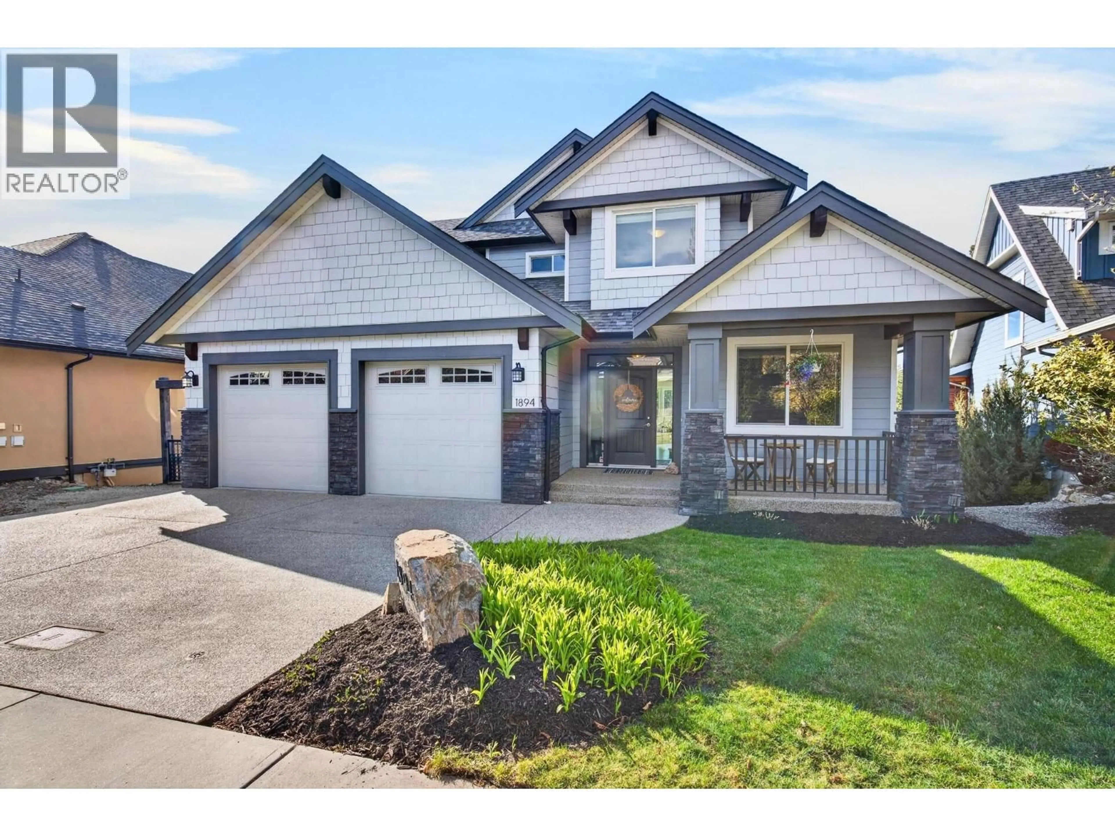 Home with vinyl exterior material, street for 1894 HIDDEN LAKE PLACE, Kelowna British Columbia V1V2W8