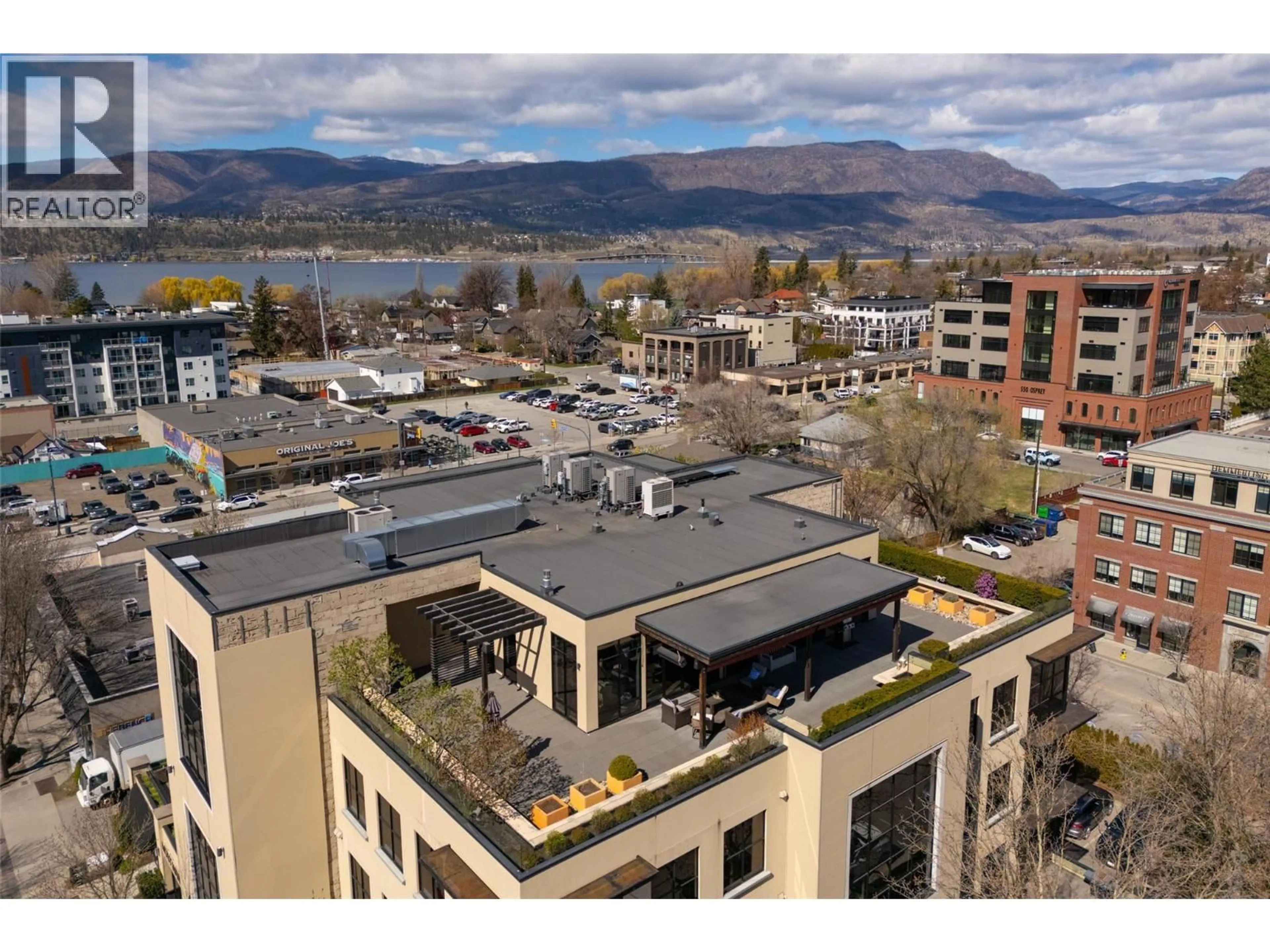 A pic from outside/outdoor area/front of a property/back of a property/a pic from drone, mountain view for 501 - 550 WEST AVENUE, Kelowna British Columbia V1Y4Z4